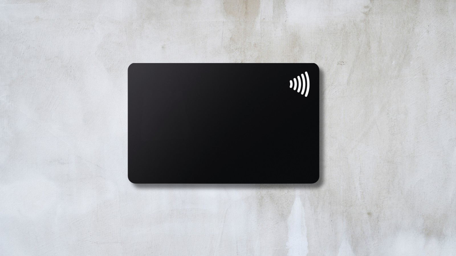 a black NFC pvc card with a wireless Logo on top made in paranaque