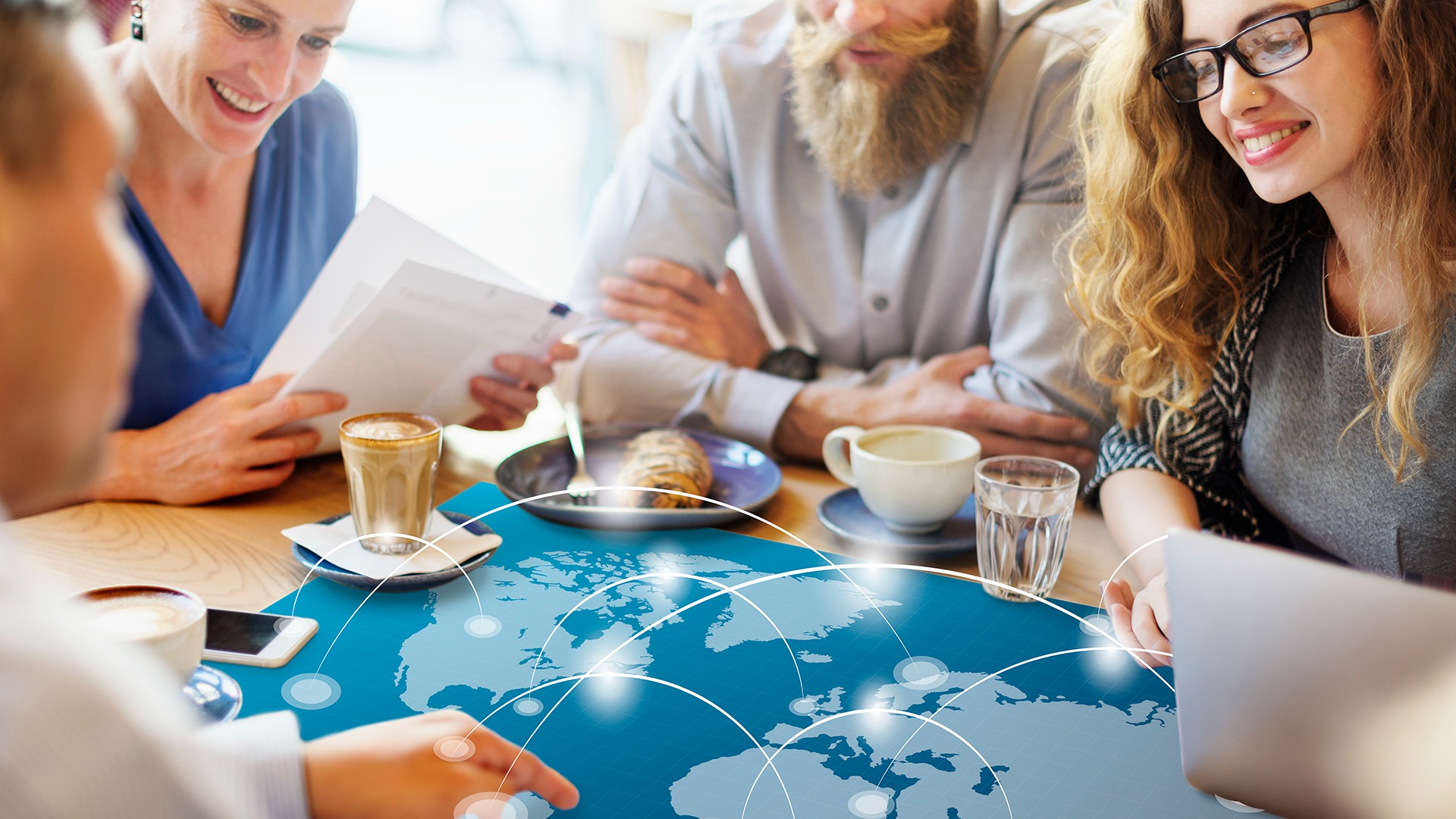 business discussions around a map