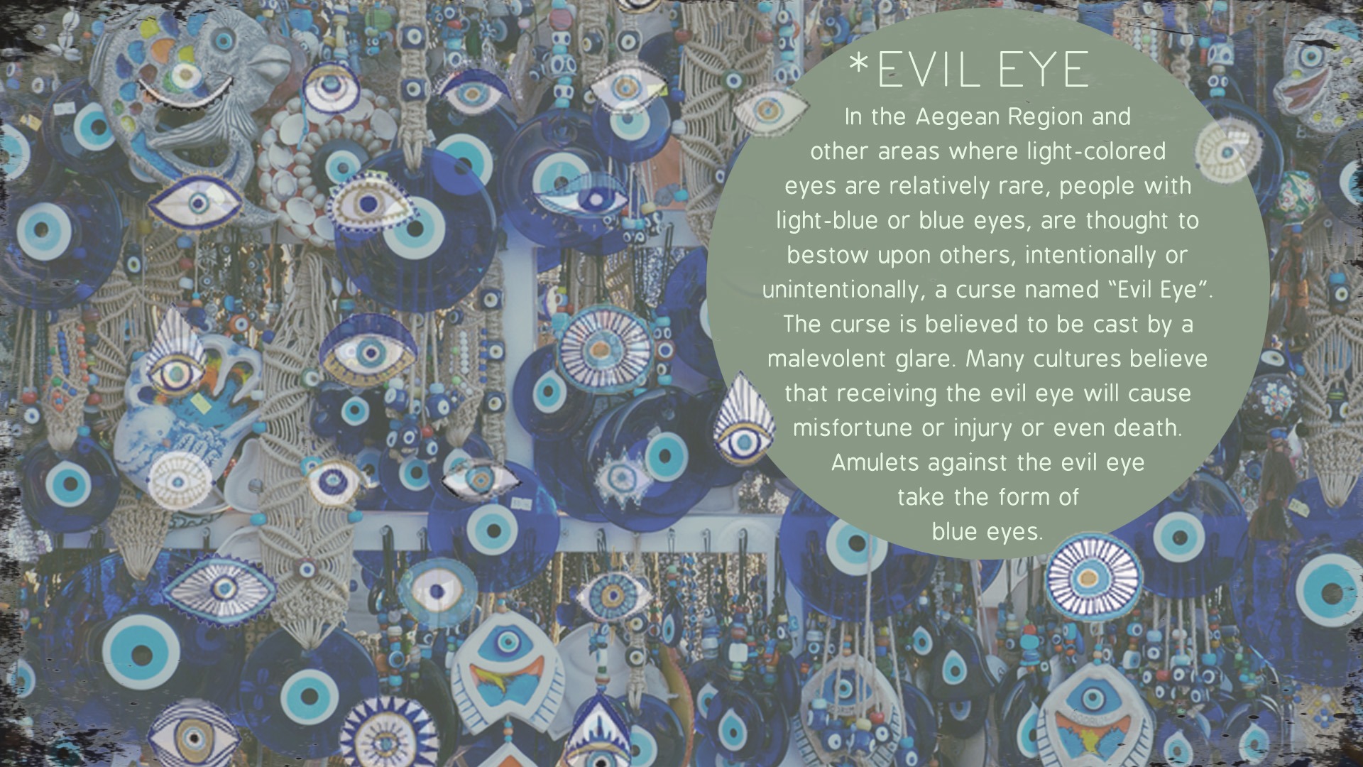 a wall hanging with evil eye eyeballs and evil eyeballs