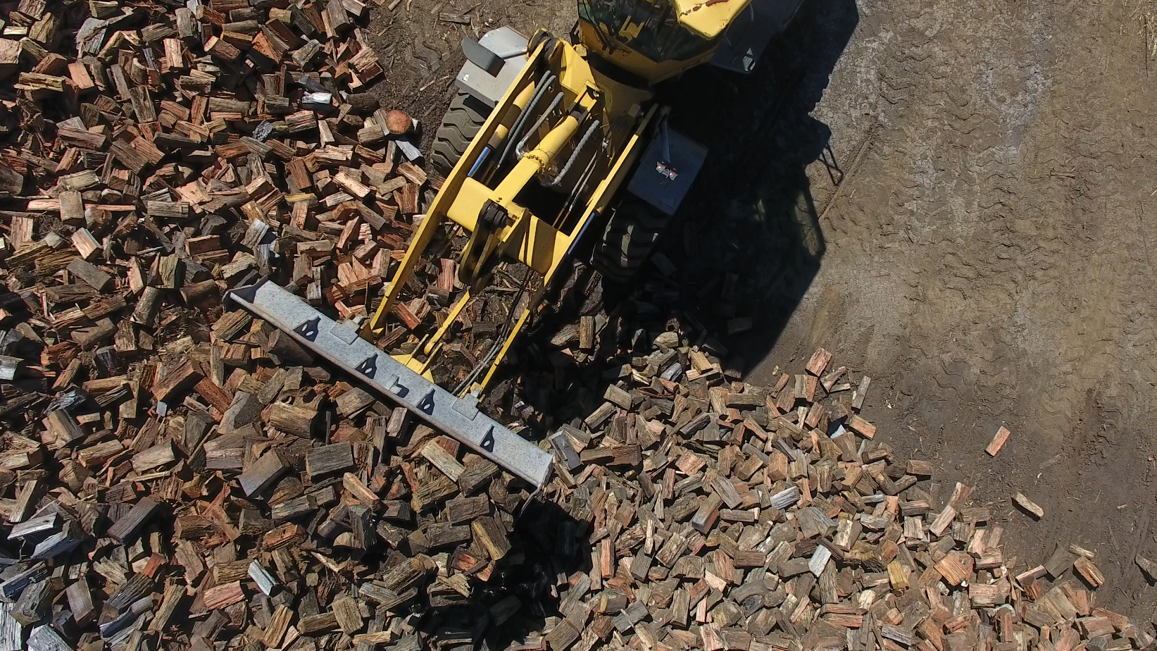 Loader bucket with firewood