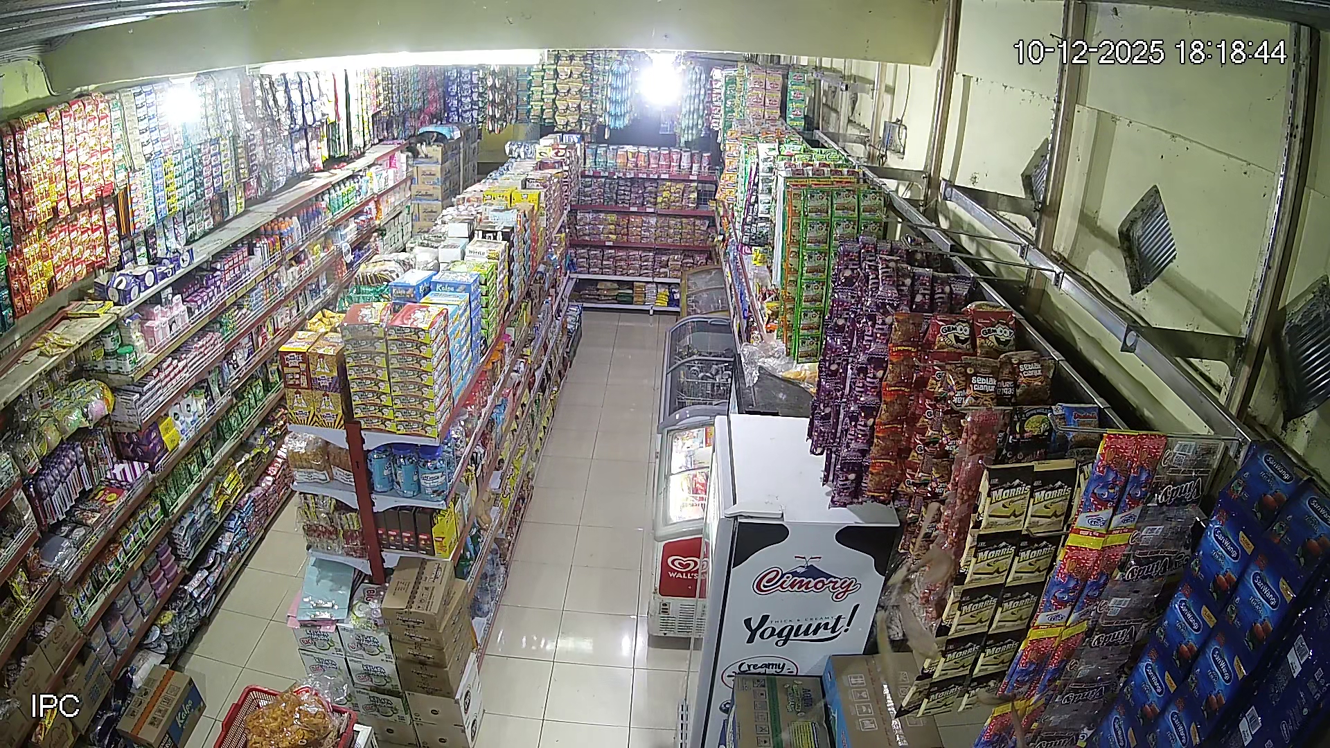 a store with a carton of food and drinks