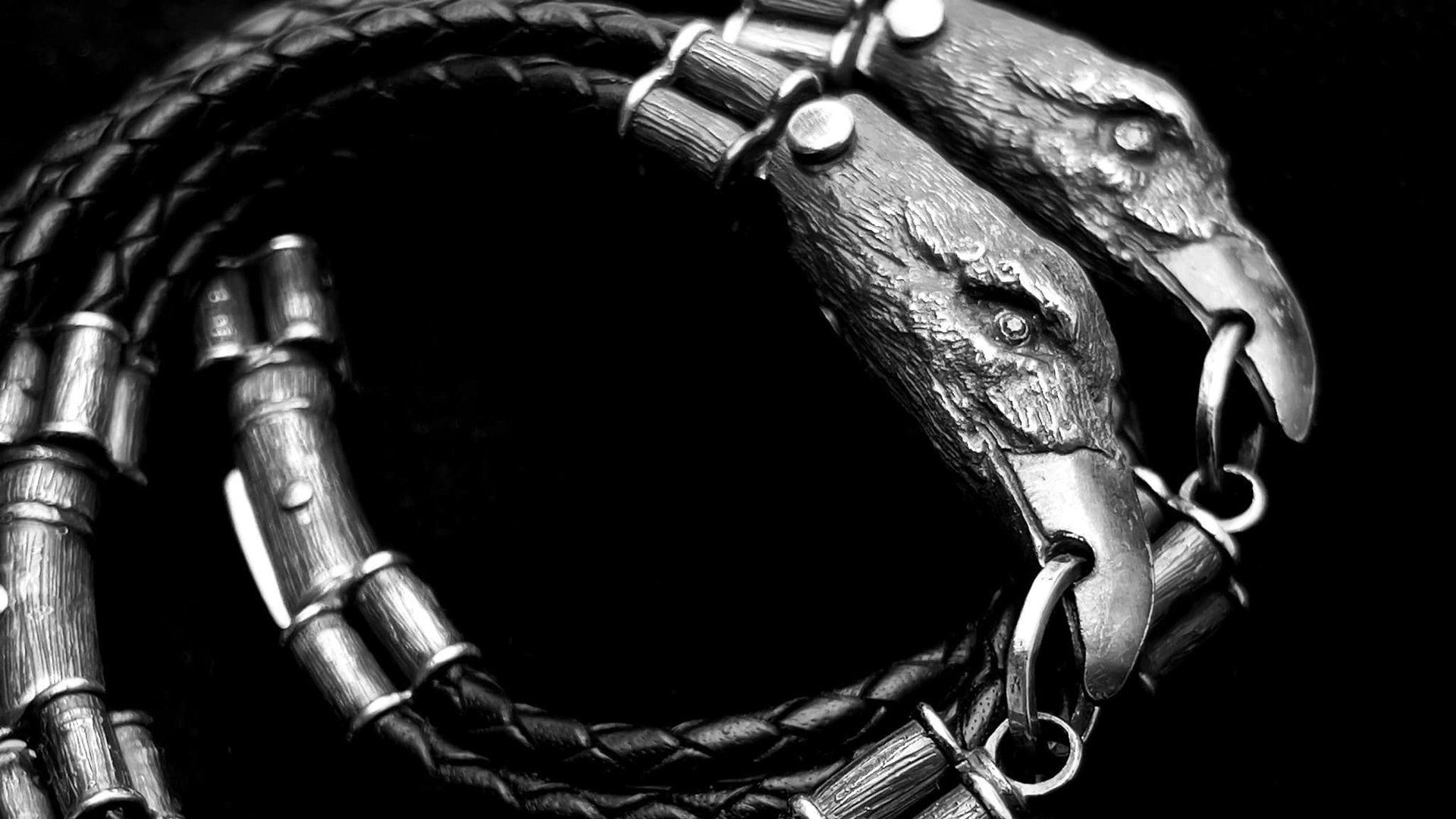 a snake skin leather bracelets with CROW head