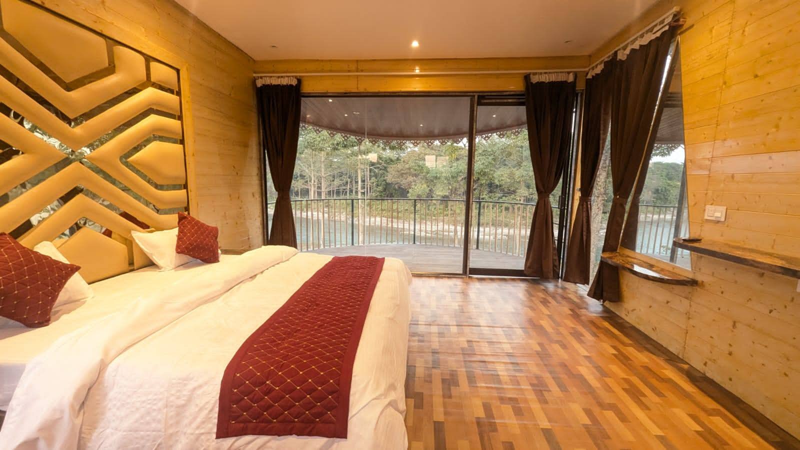 a bedroom with a bed and a television