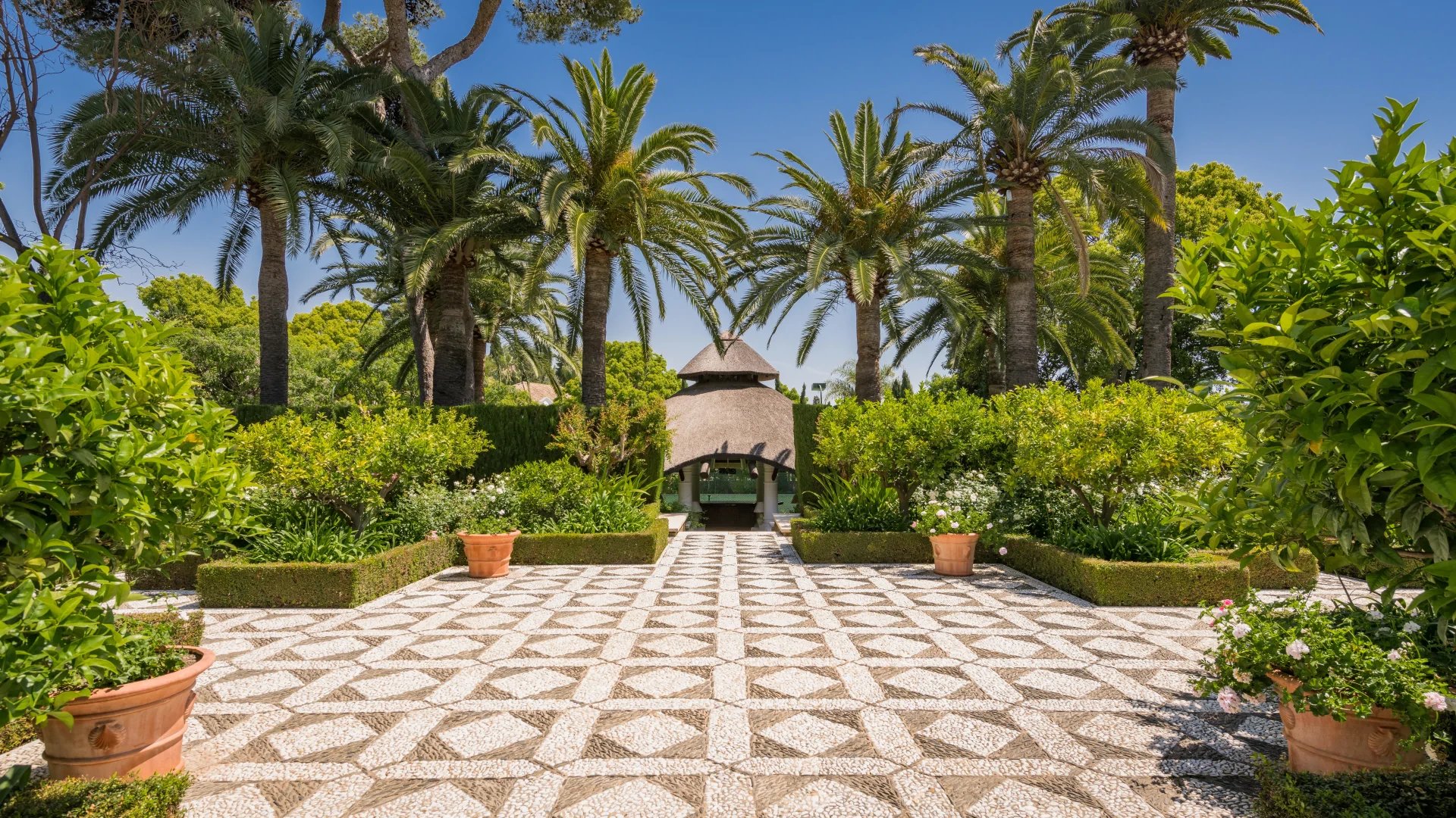 Palm garden pavilion within landscaped estate in Marbella