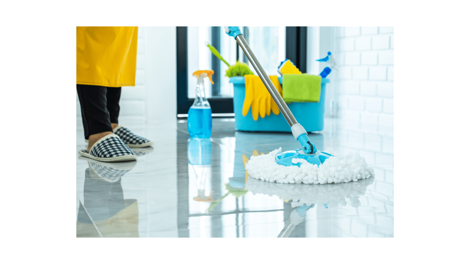 a person cleaning a floor with a mop