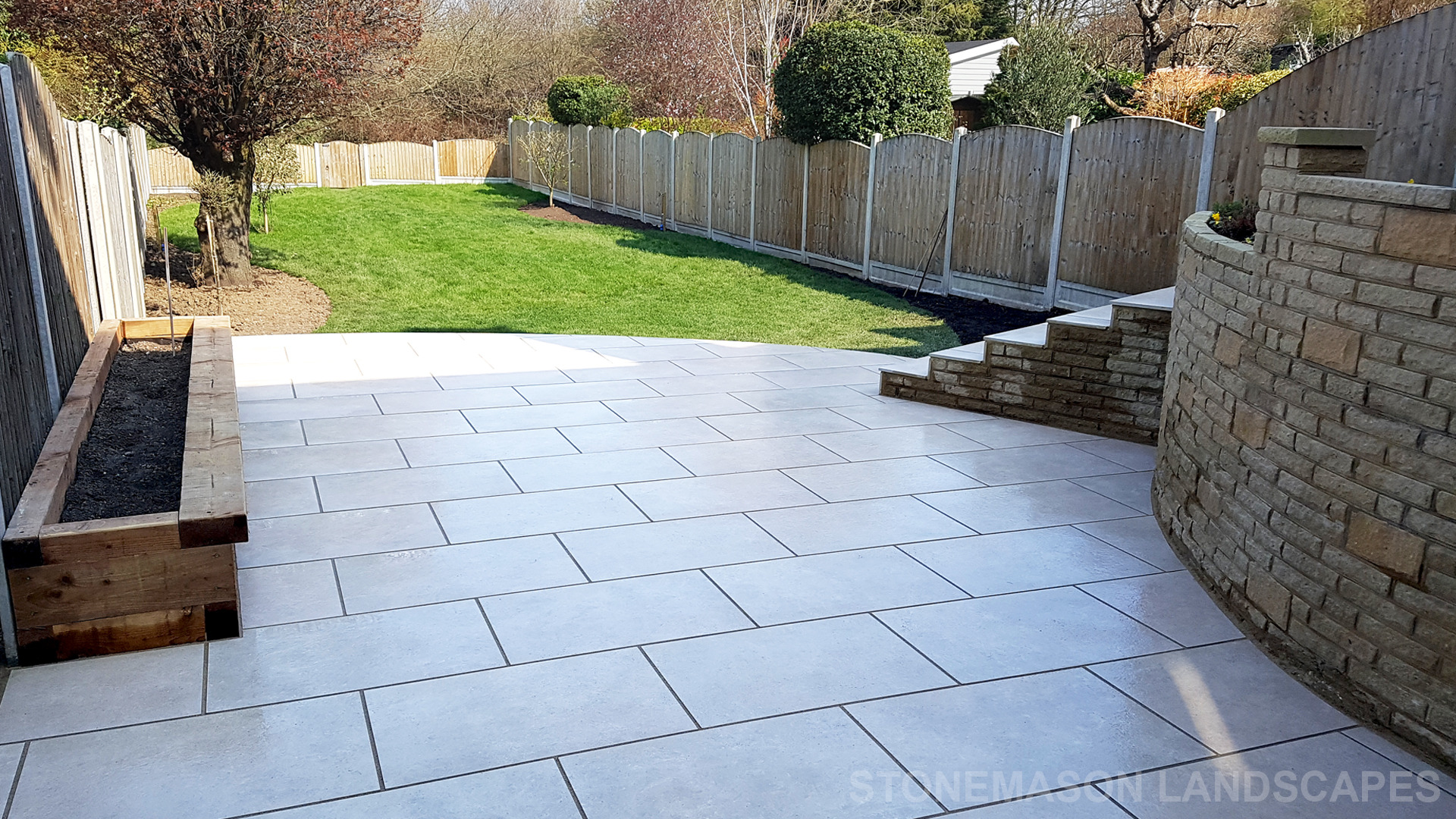 Elevated raised porcelain patio renovation and lawn levelling - Upminster 