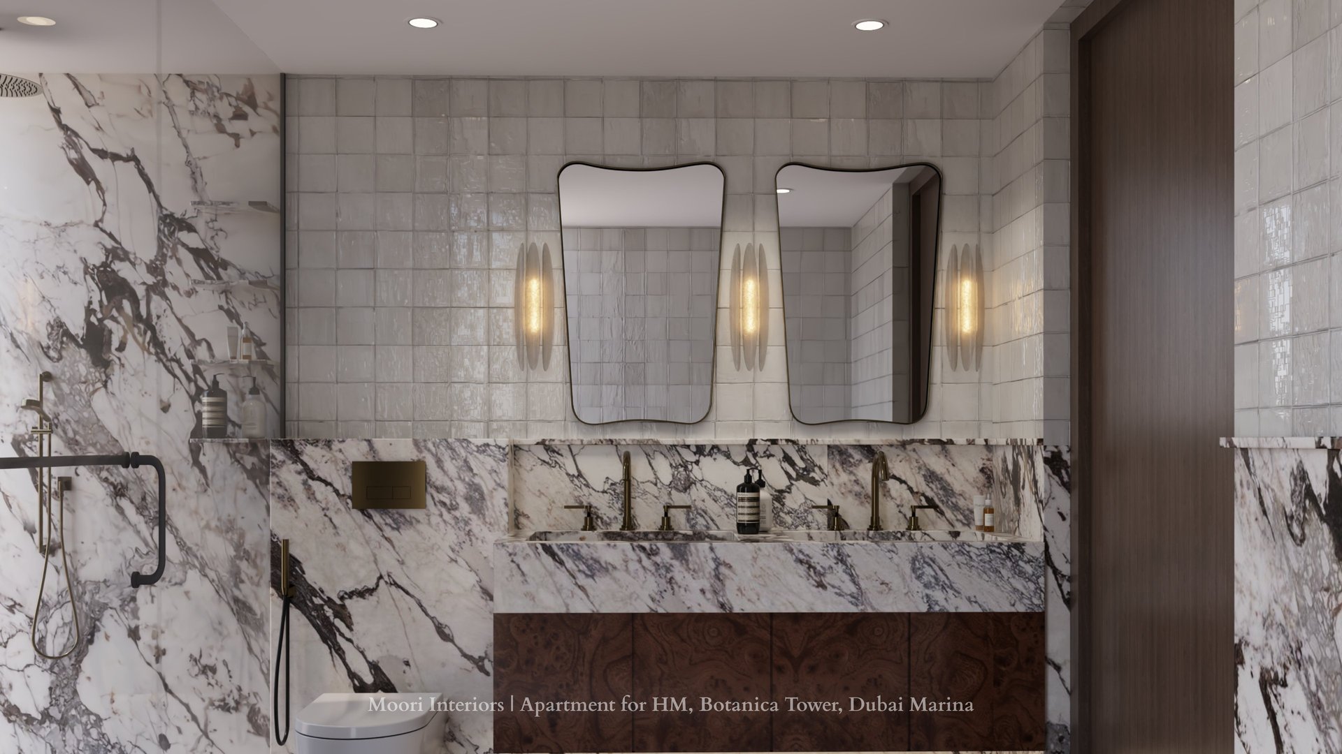Marble-clad bathroom with two distinct mirrors and gold fixtures.