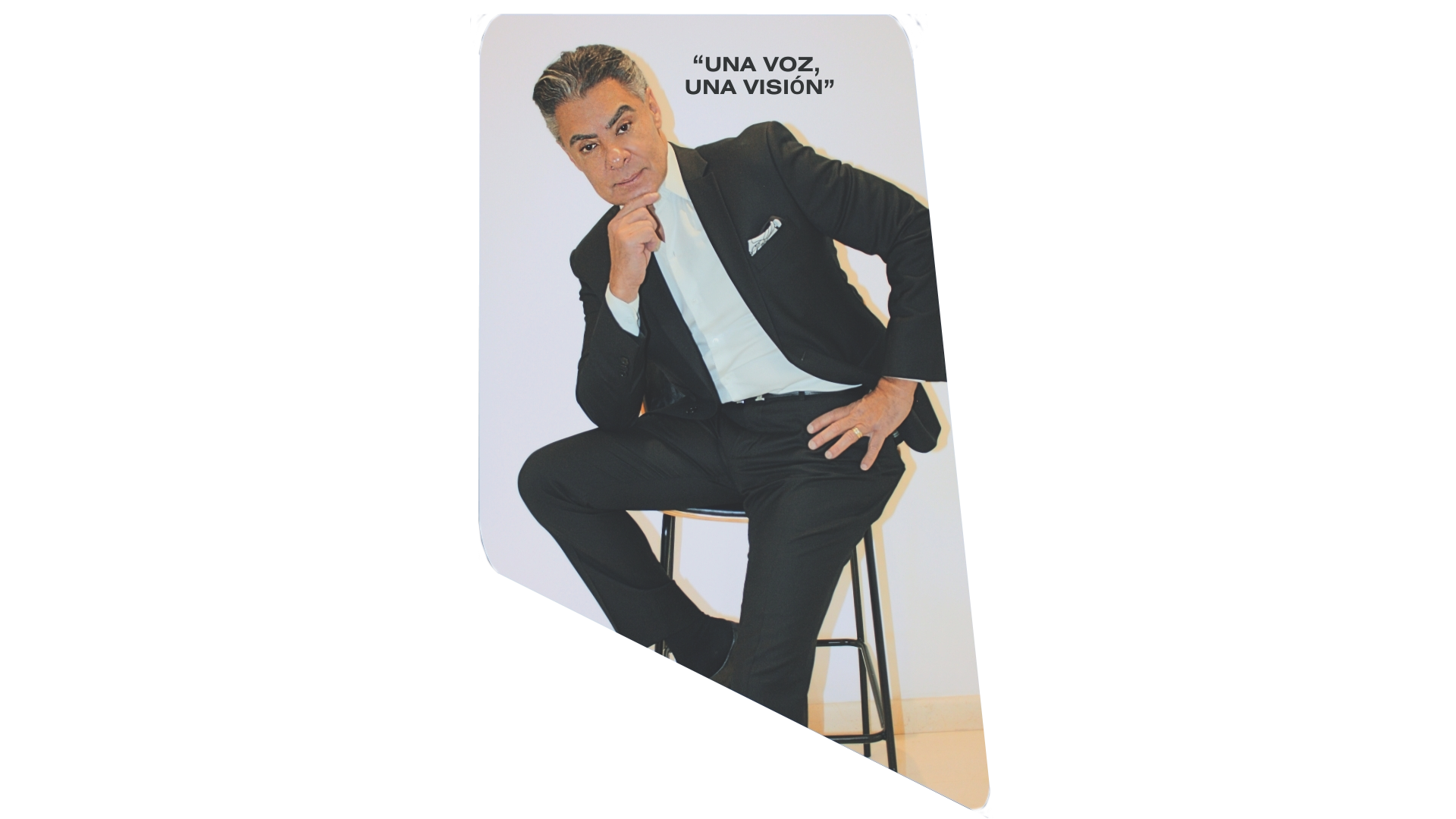 a man in a suit and tie is posing for a picture