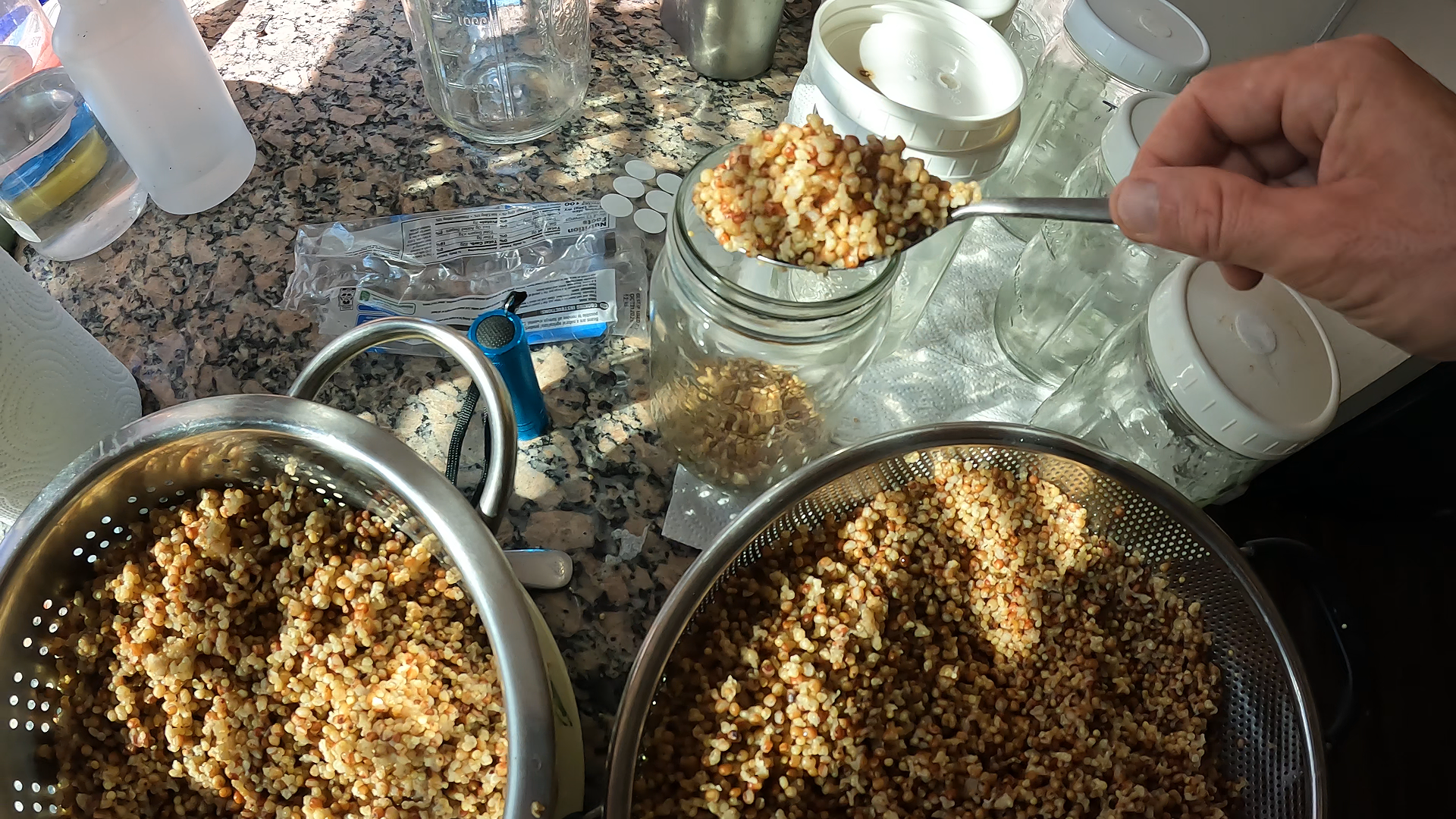 loading mason jars with wild bird seed