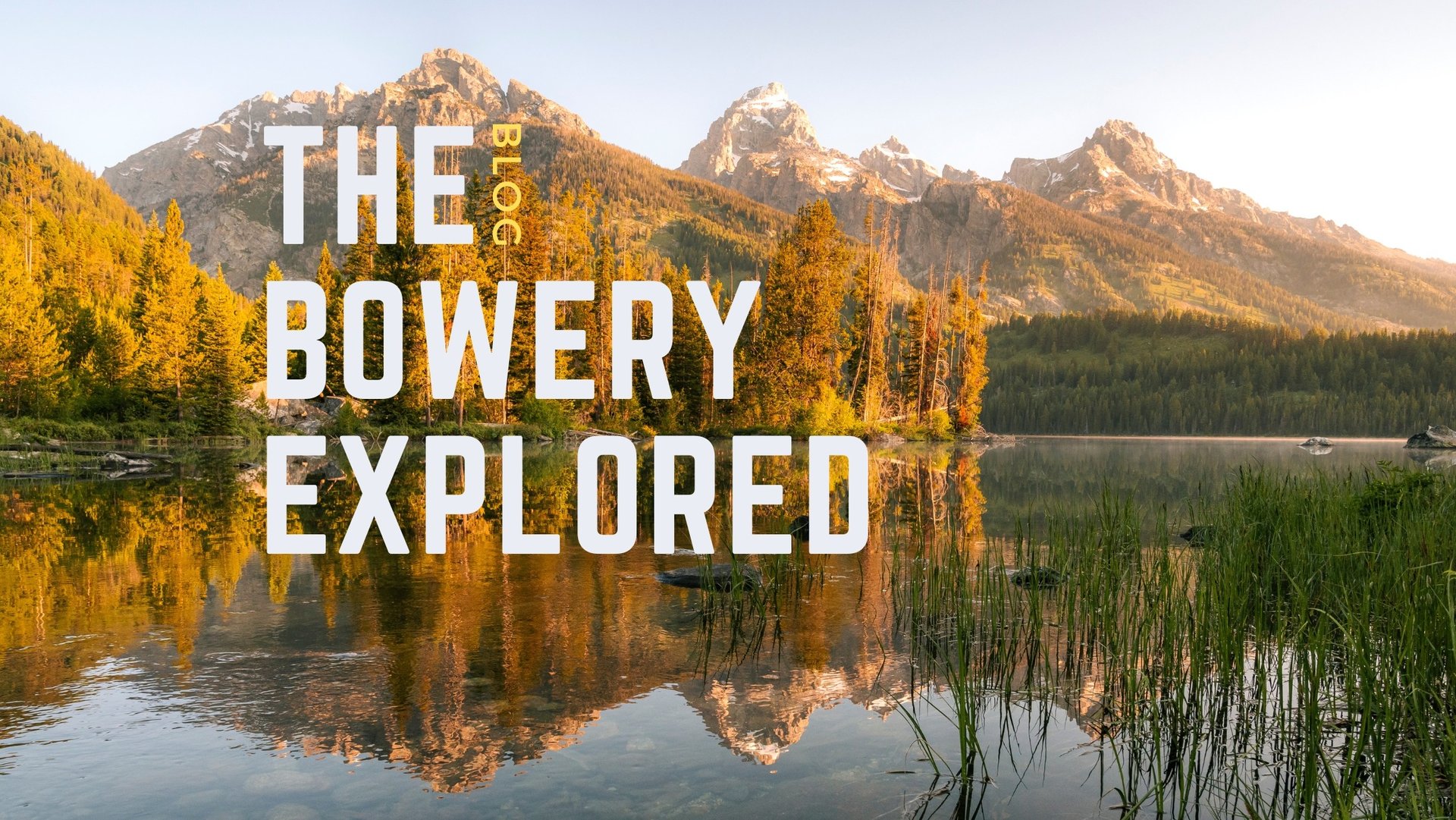 Warm Golden light bathing The Grand Tetons in warmth during a summer sunrise at Taggart Lake