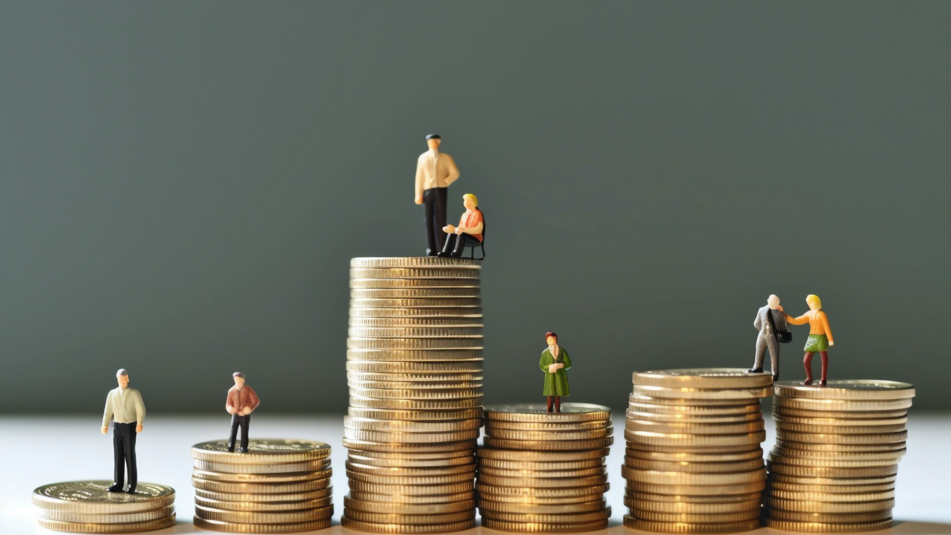 different stacks of coins representing different 401k age groups