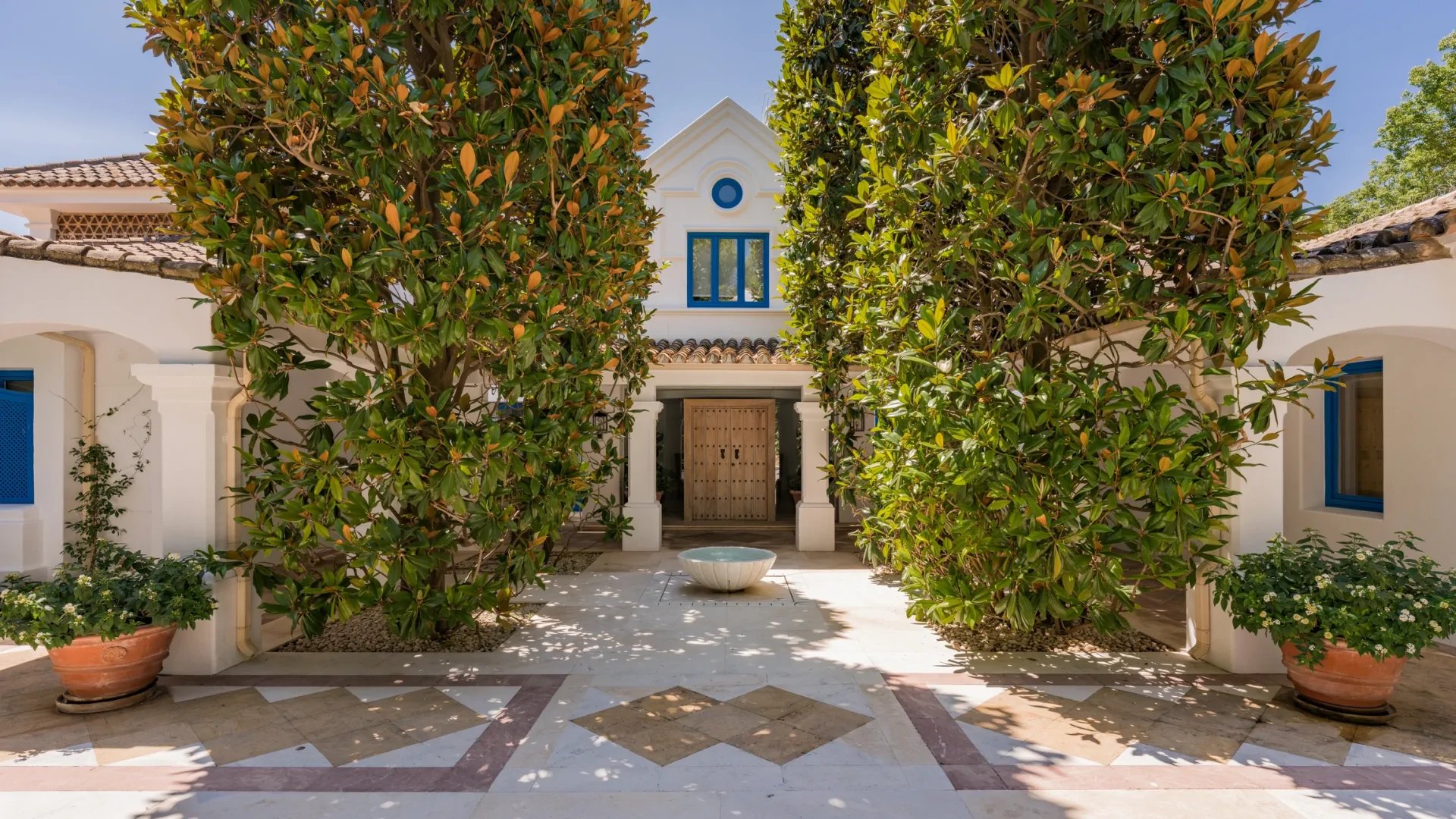 Symmetrical courtyard entrance of classic Marbella villa