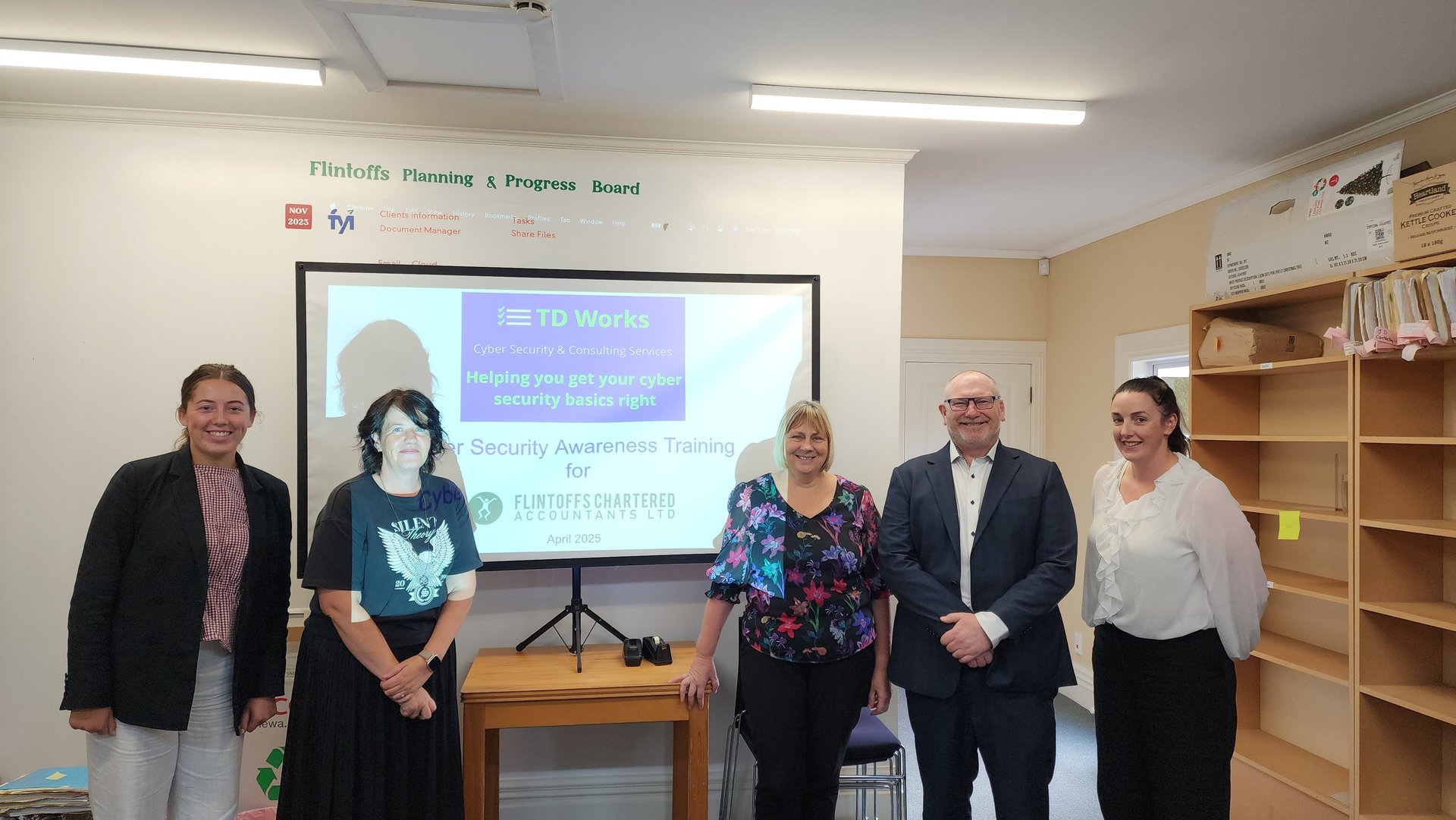 Jo Thomson (2nd from the left), Jackie Palmer, Andrew TD + 2 others from Flintoffs.
