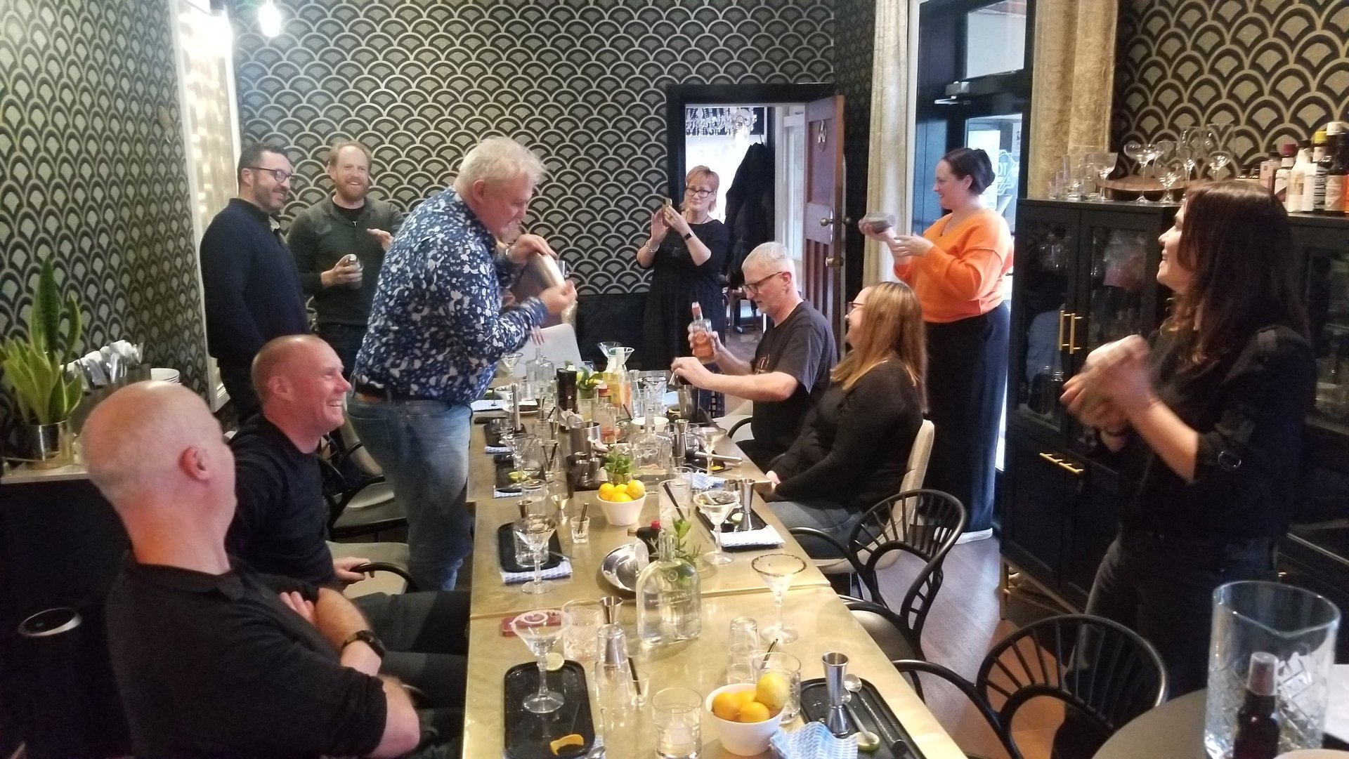 Group of coworkers enjoying a fun Cocktail class together at Tonic Bar & Bistro