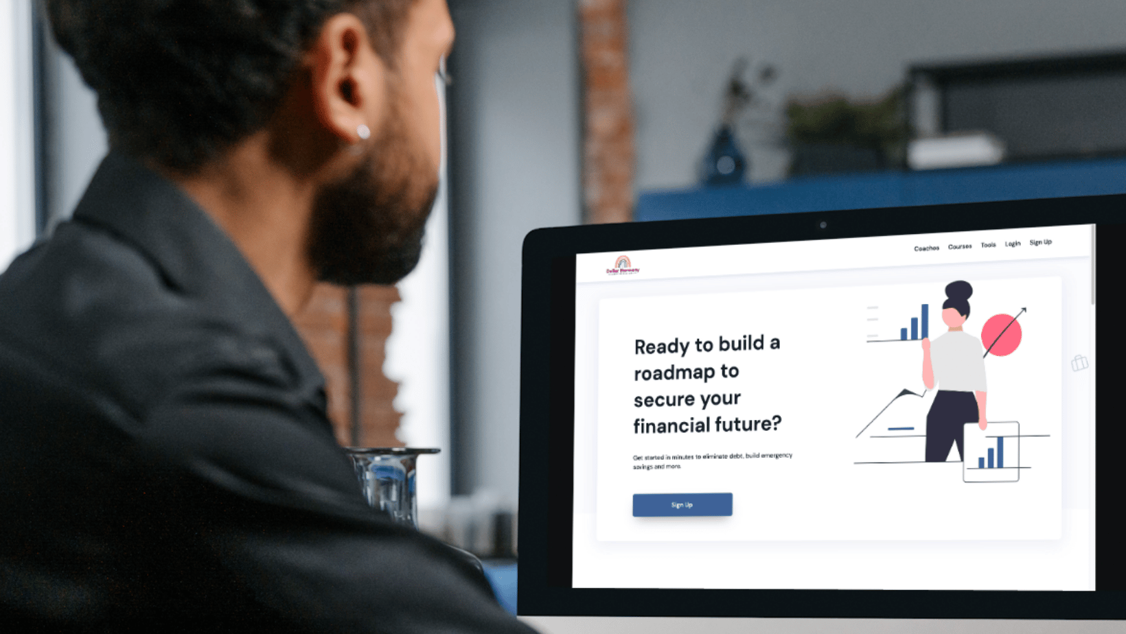 a man sitting at a computer screen with a laptop and looking at the Dollary Harmony App