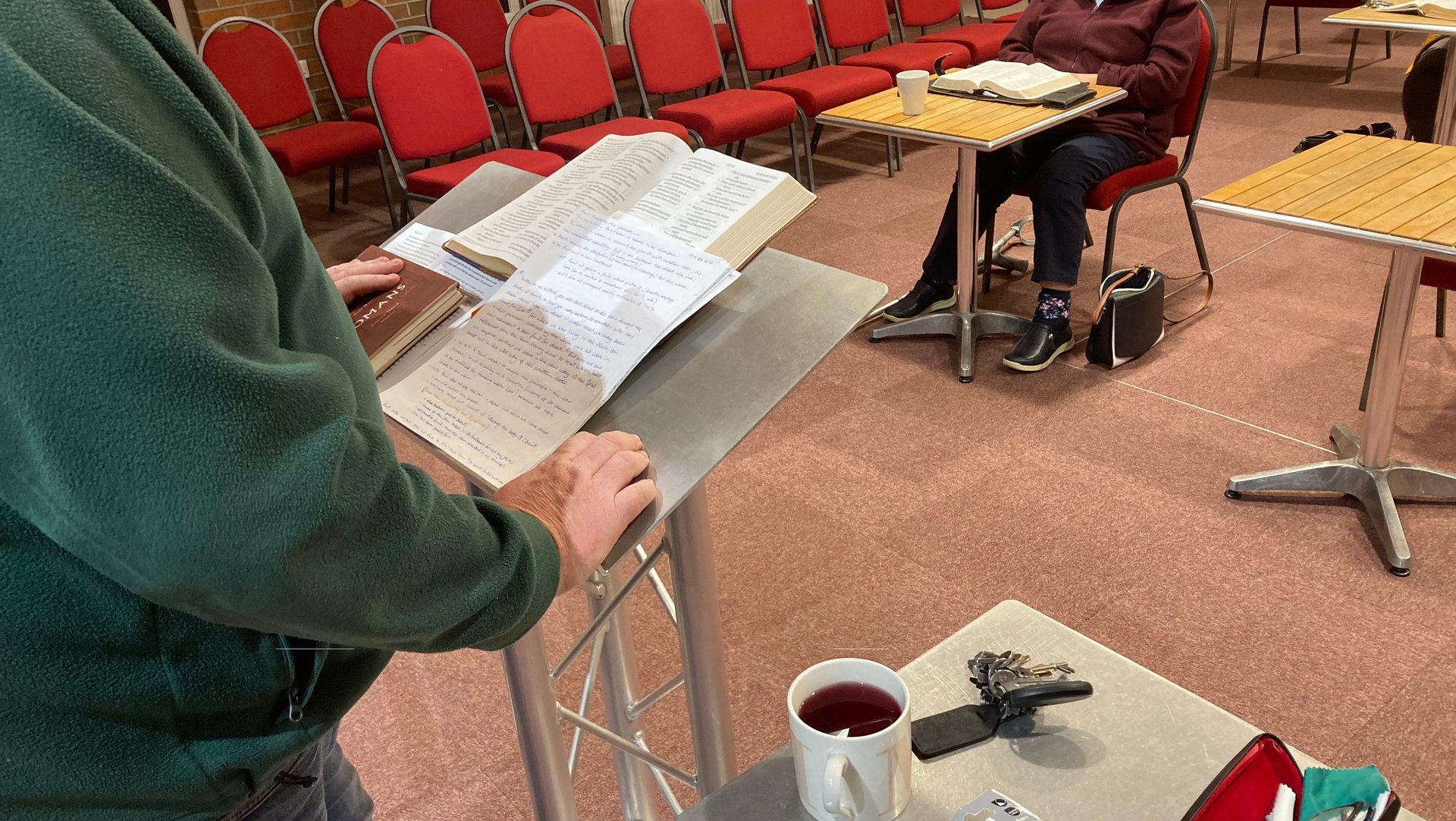 Gary Brown standing at preaching lectern