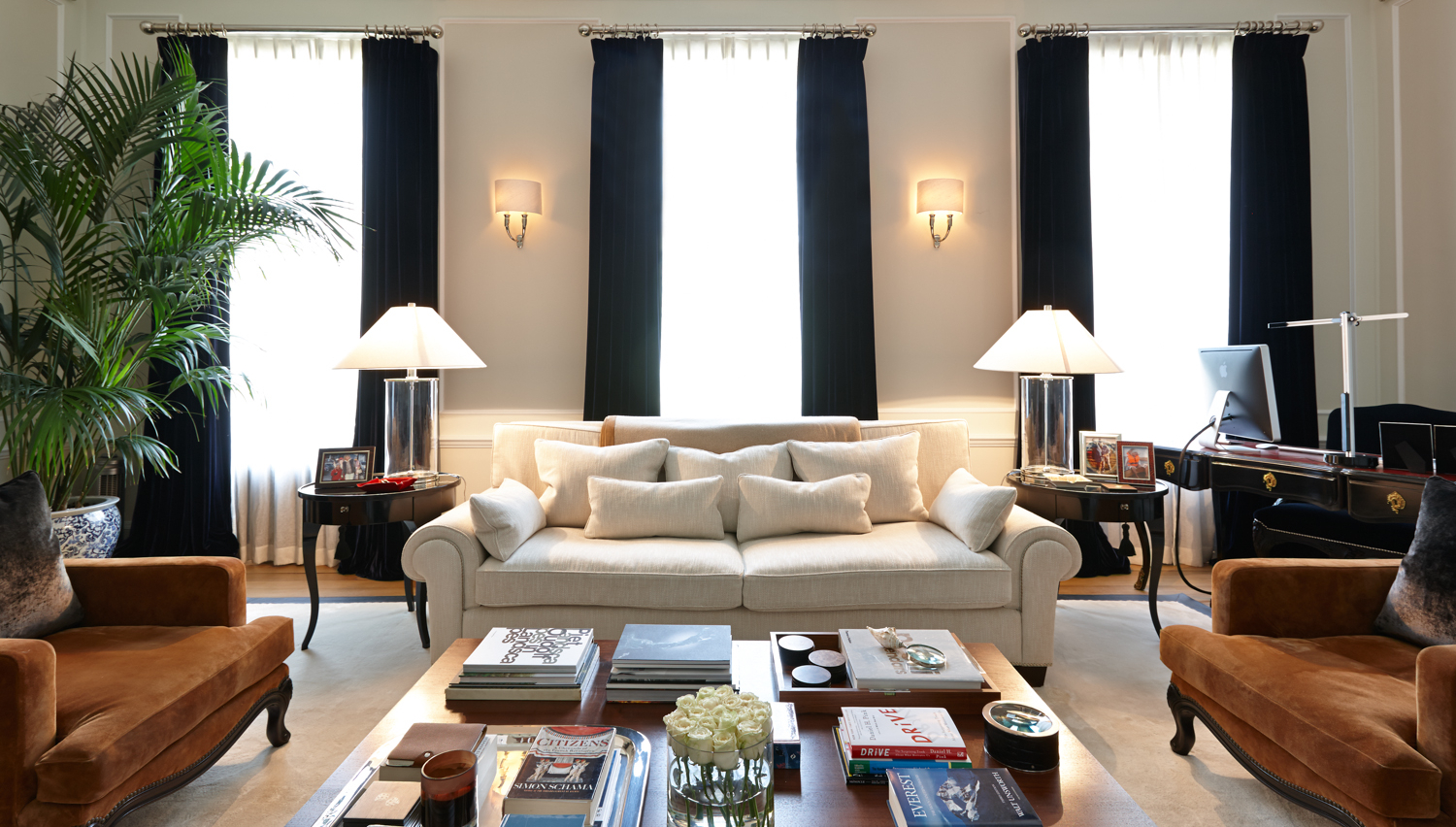 a living room with a couch and a table Nour Nagy Designs London interior Design