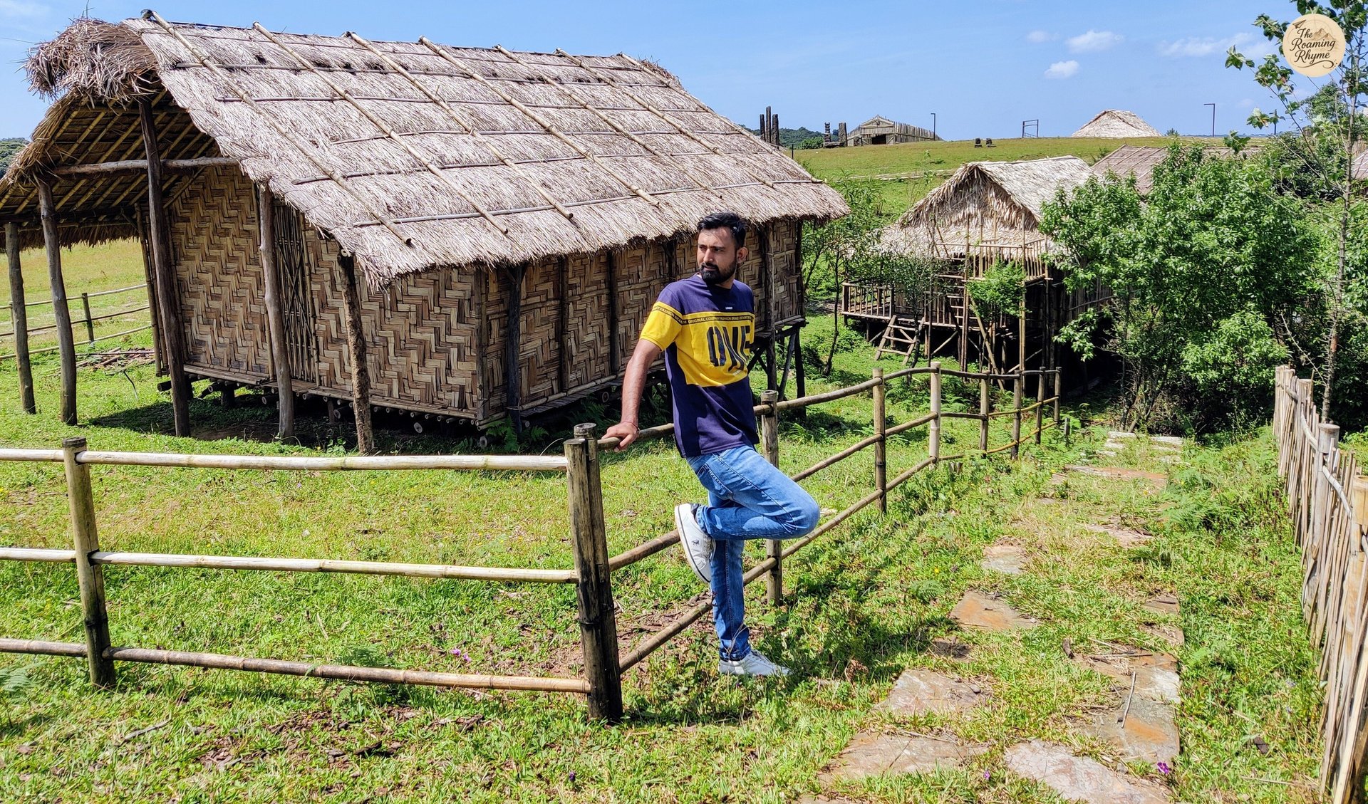 Khasi Heritage Village, Meghalaya - walking past traditional huts.