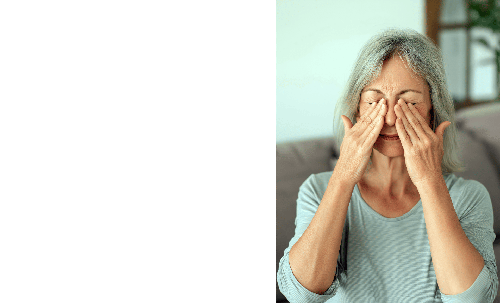 Adult with myopia rubbing her eyes