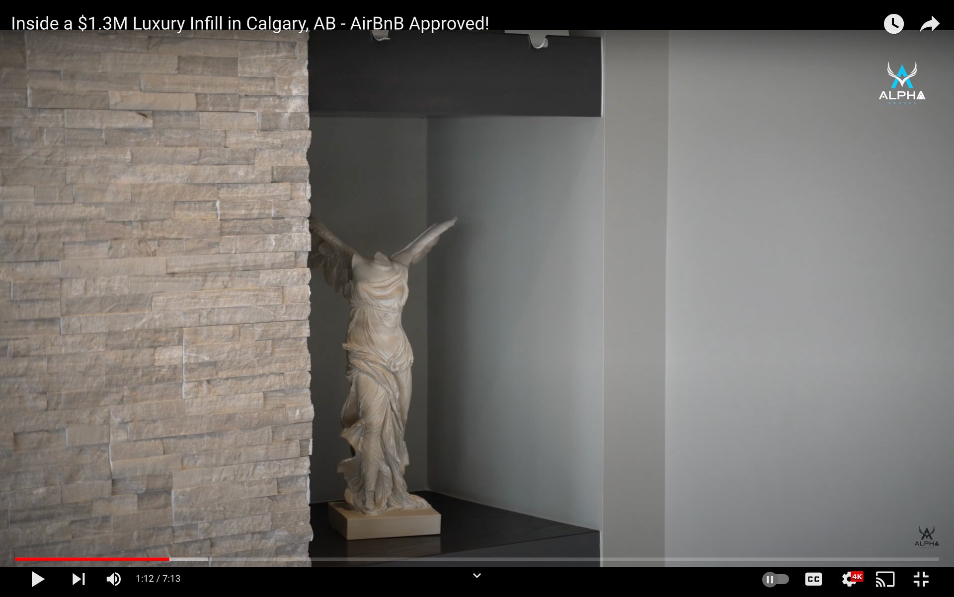 a statue of a woman holding a sword