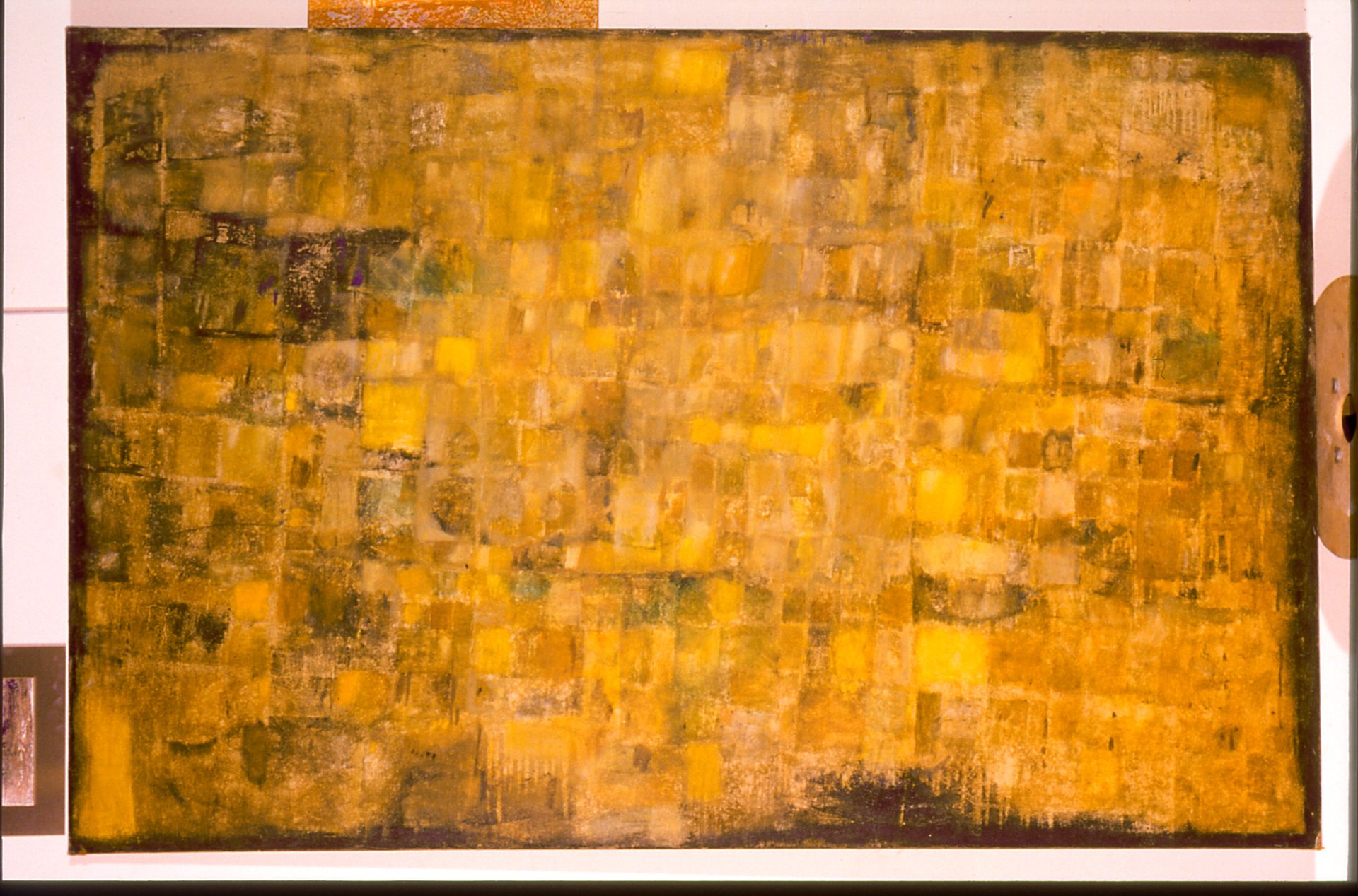 Abstract oil painting with textured yellow and gold squares creating a mosaic pattern.