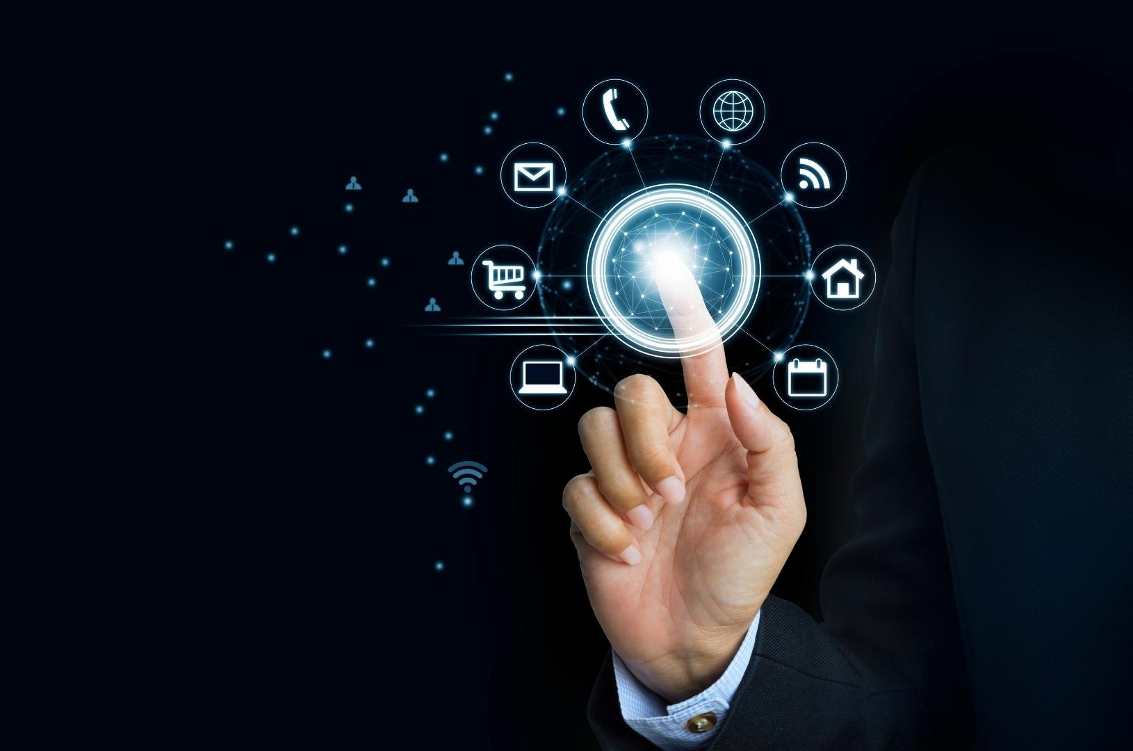 a person touching a button on a button - Illford Academy