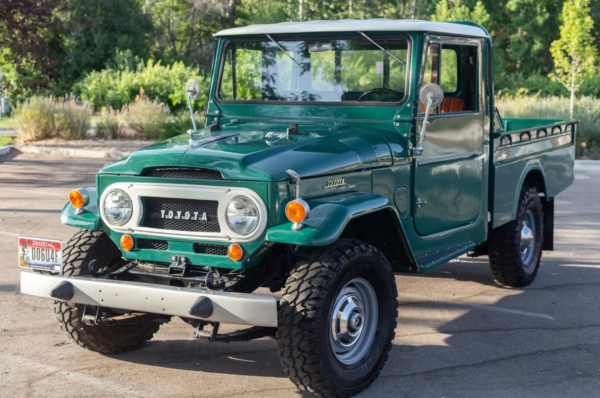 Three quarter front view shot of a green 1967 Toyota Land Cruiser.