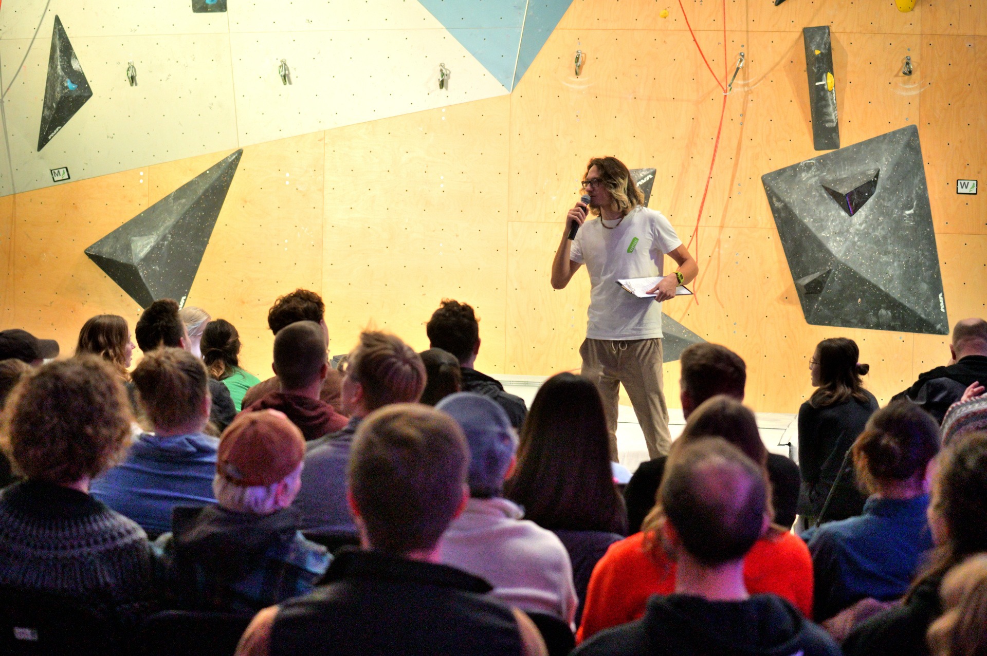 a man standing in front of a crowd of people