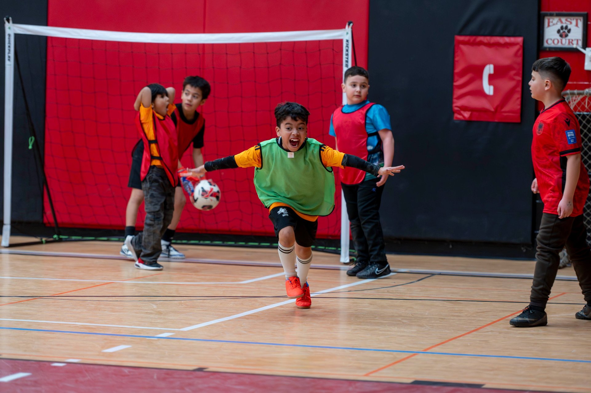 MVB FC player celebrates scoring a goal during an indoor youth soccer game indoor Mississauga