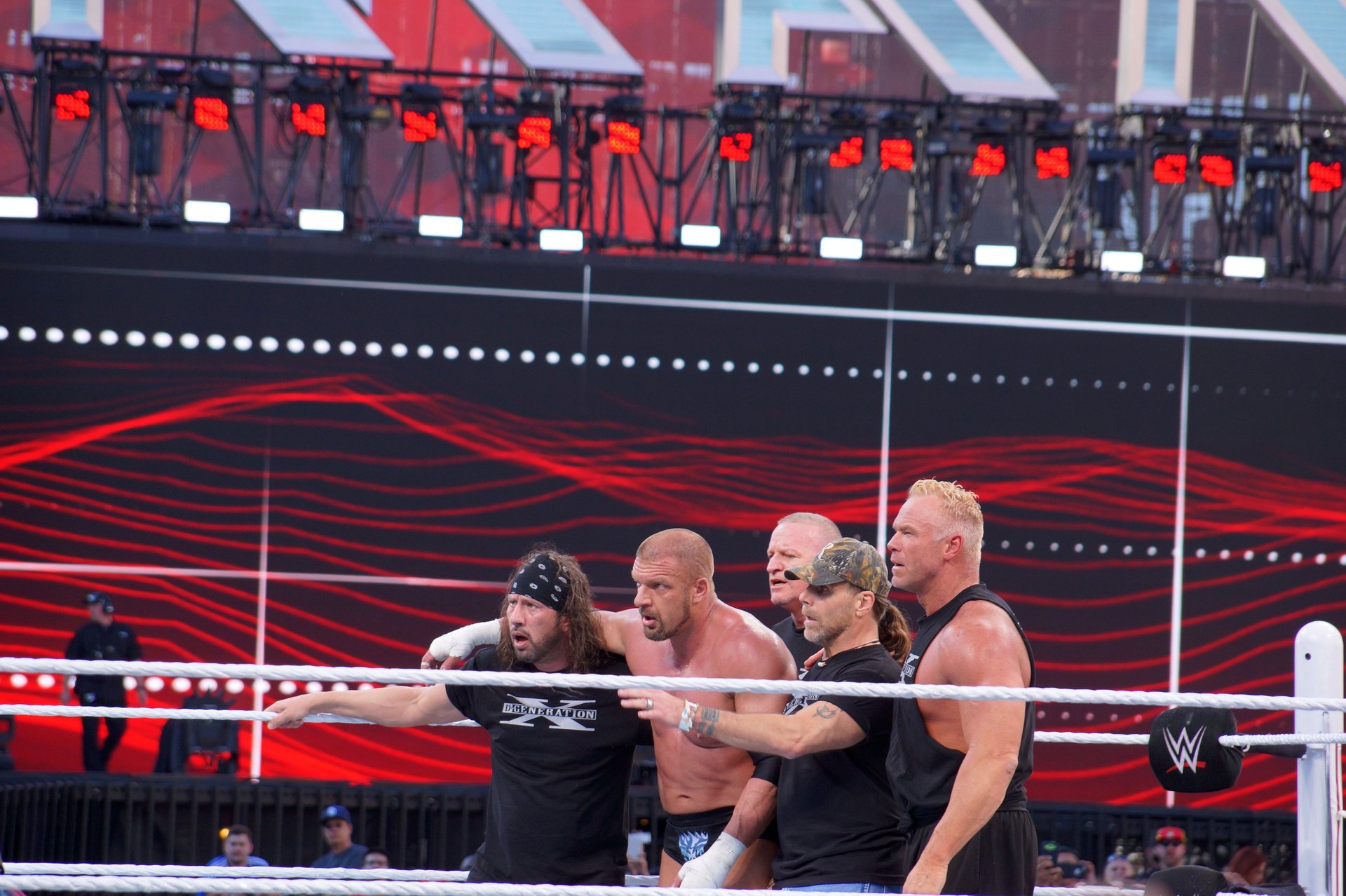 shawn Michaels with other fighters in ring