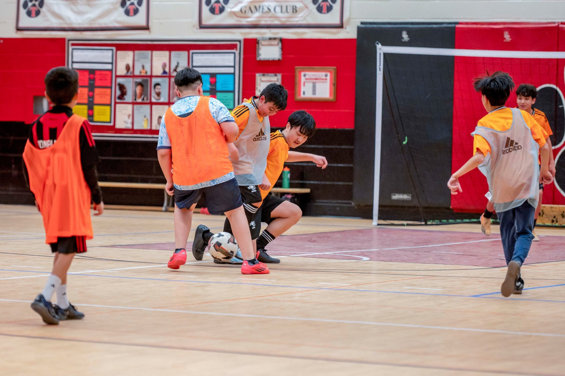 Young MVB FC students playing indoor soccer game in Mississauga