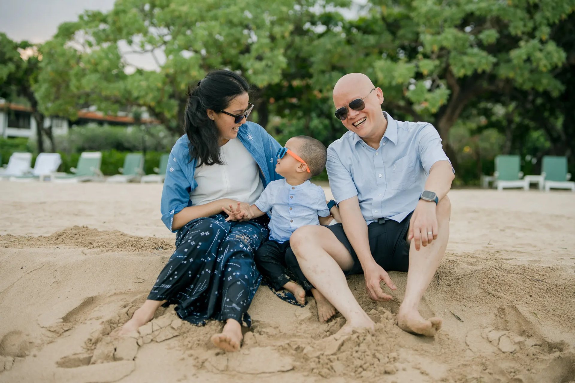 Family portrait captured at sunset during a natural family photography session at Nusa Dua Beach Bali