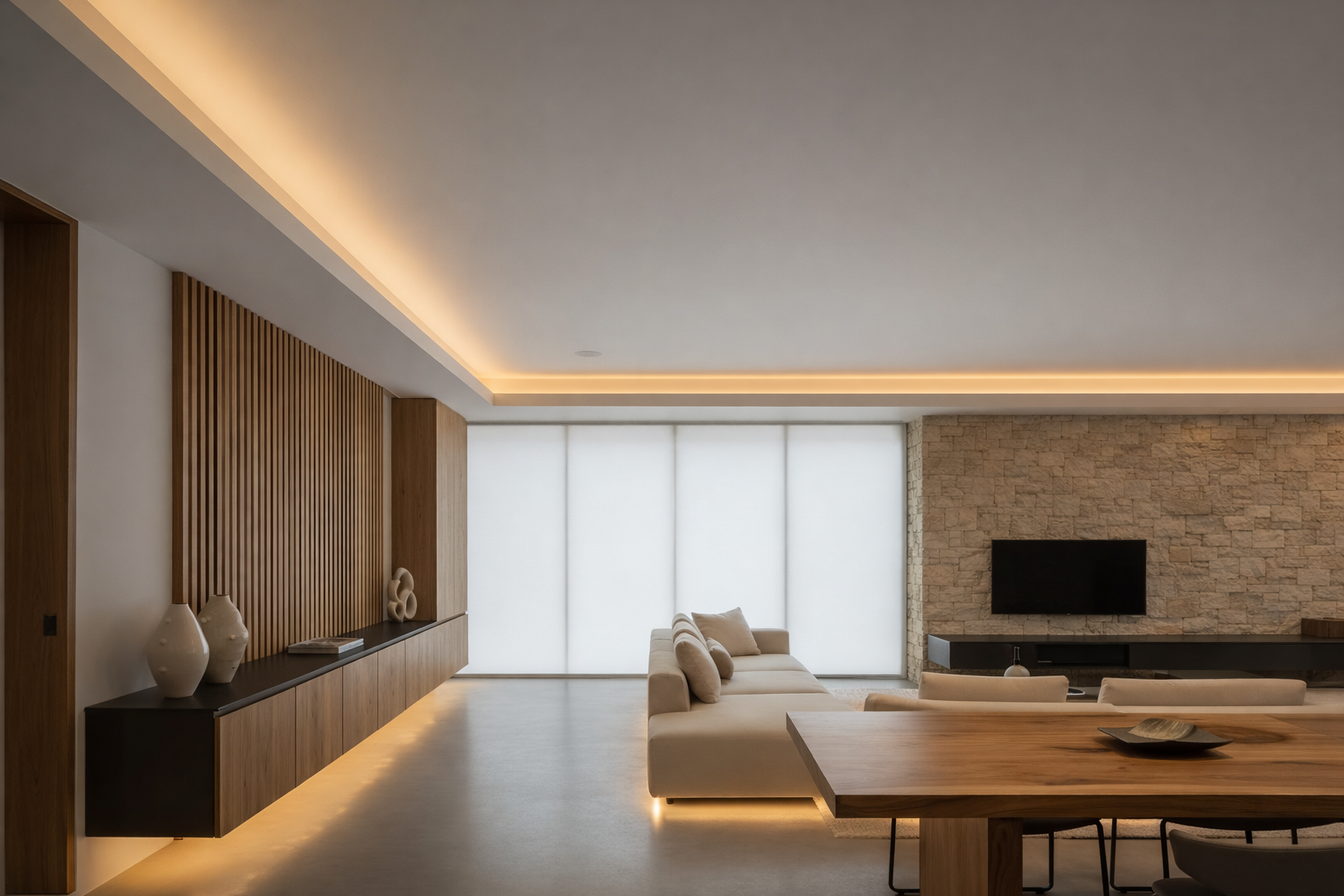 Projeto de iluminação residencial com luz indireta integrada ao teto e mobiliário em ambiente contemporâneo acolhedor