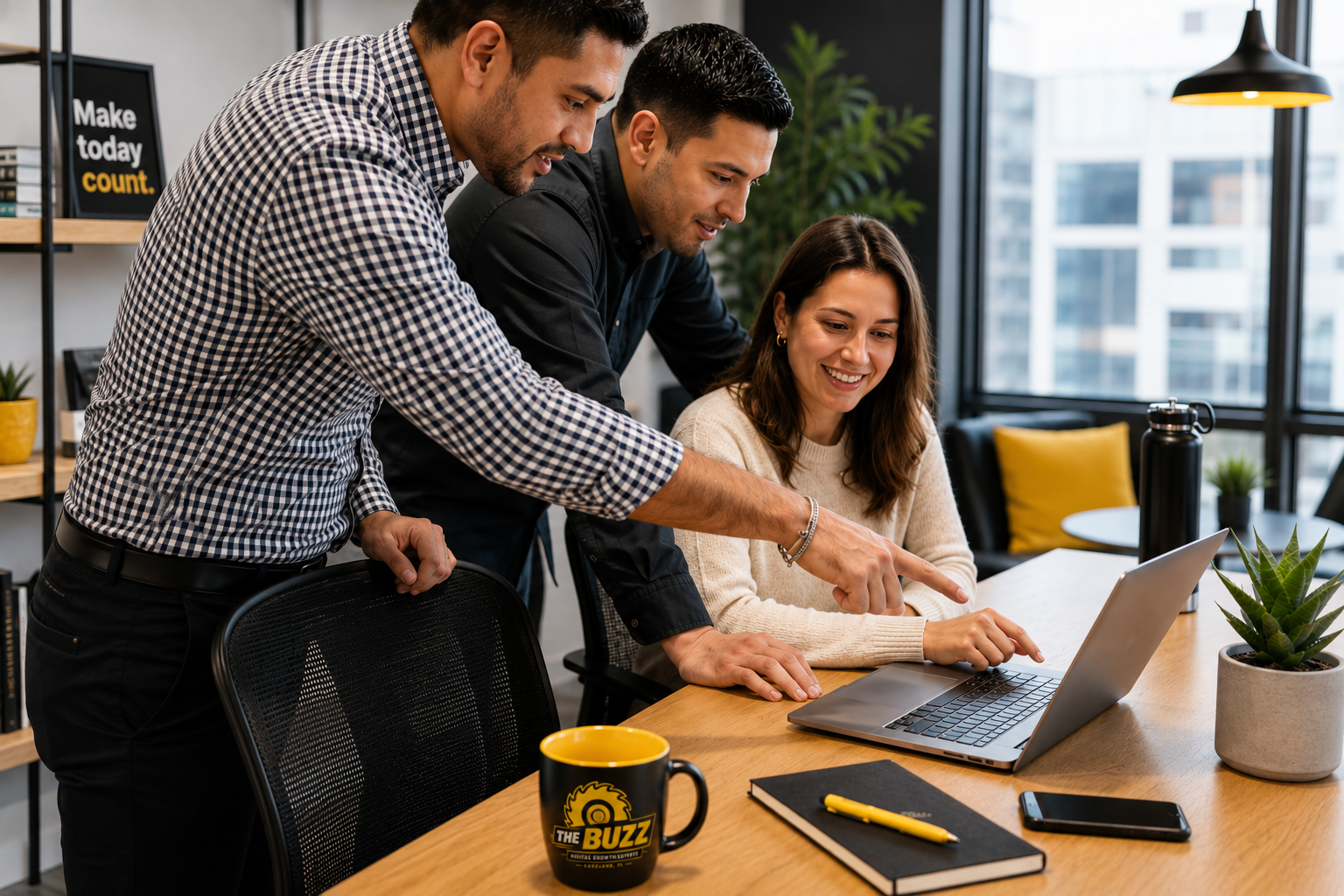 The Buzz digital marketing team reviewing Google Ads, Meta advertising, and online growth strategies