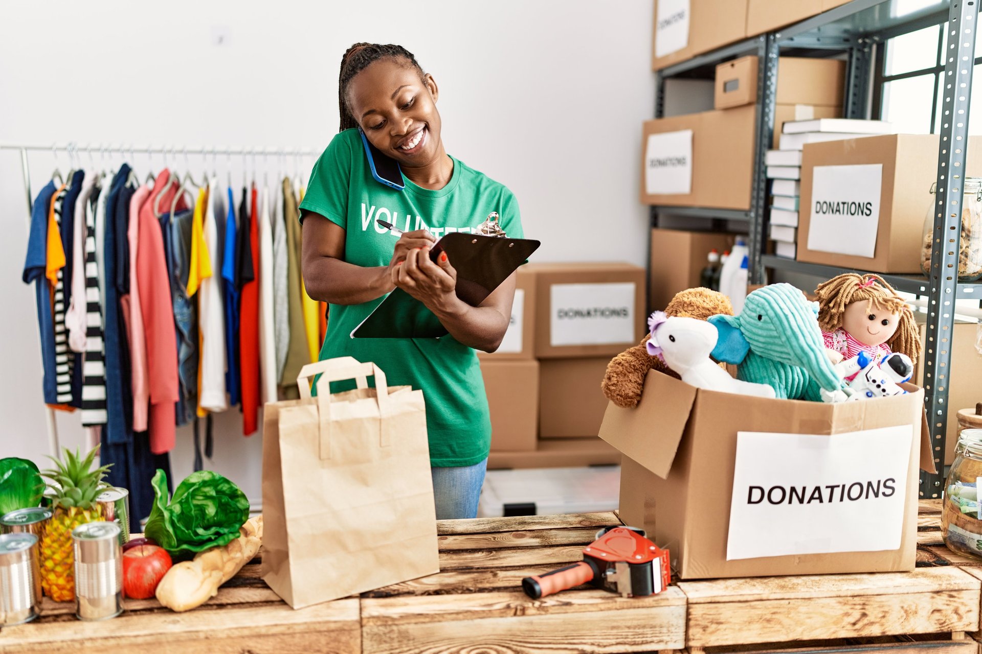 African American Woman Volunteering at donation station