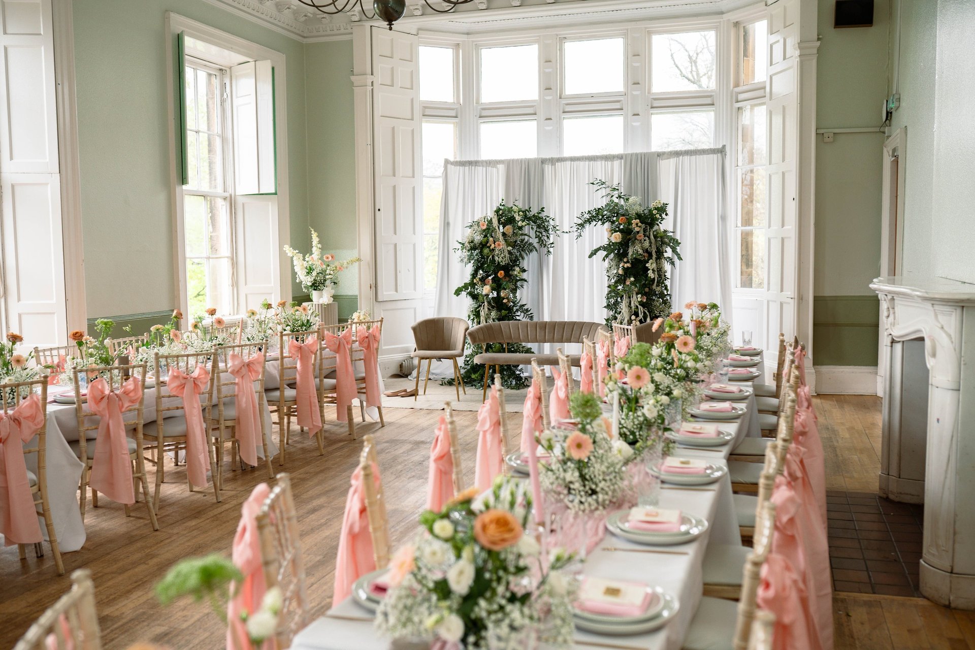 a long table with a bunch of flowers on it