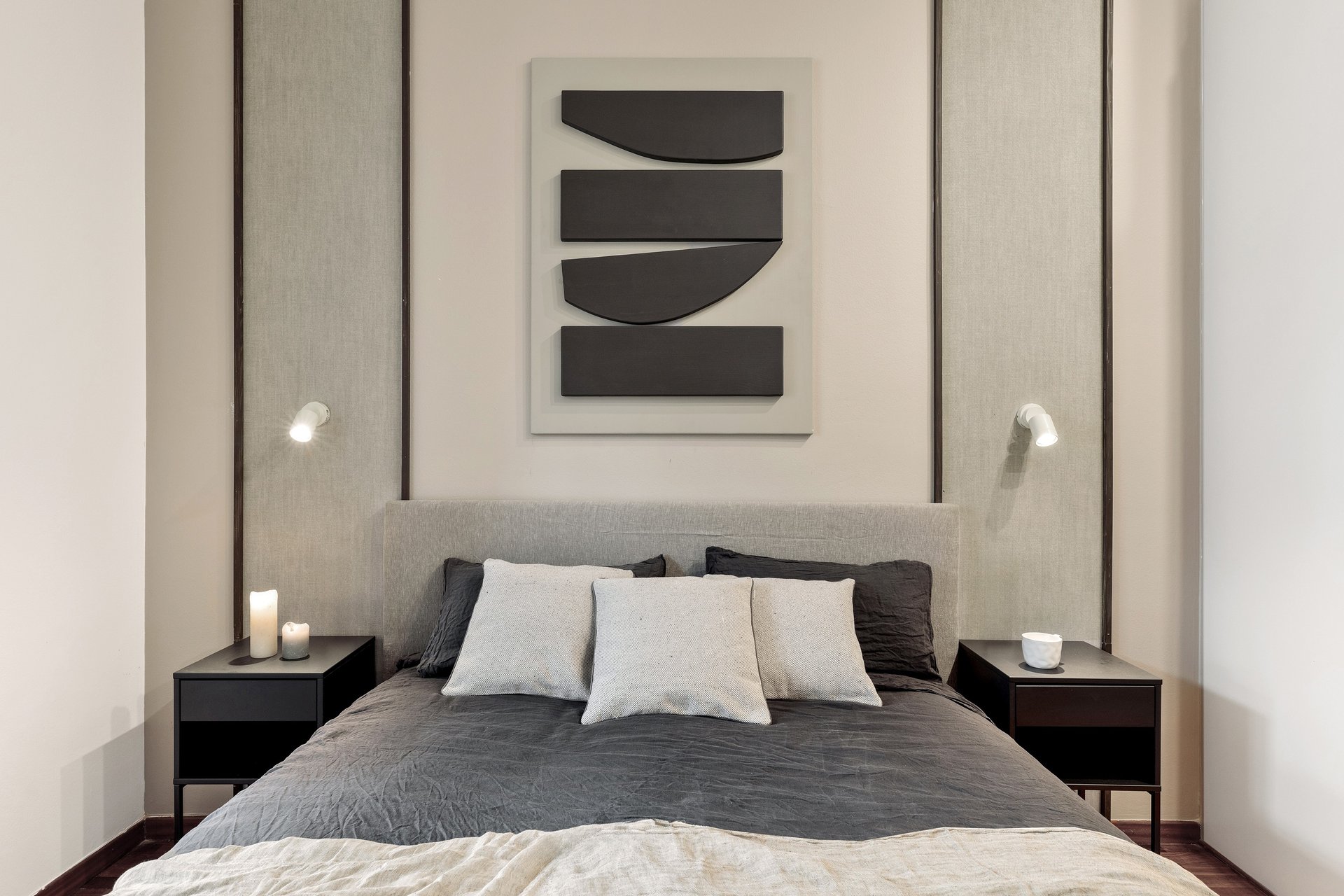 Elegant bedroom design with custom wall panels and bold decor details, designed by SAVIA