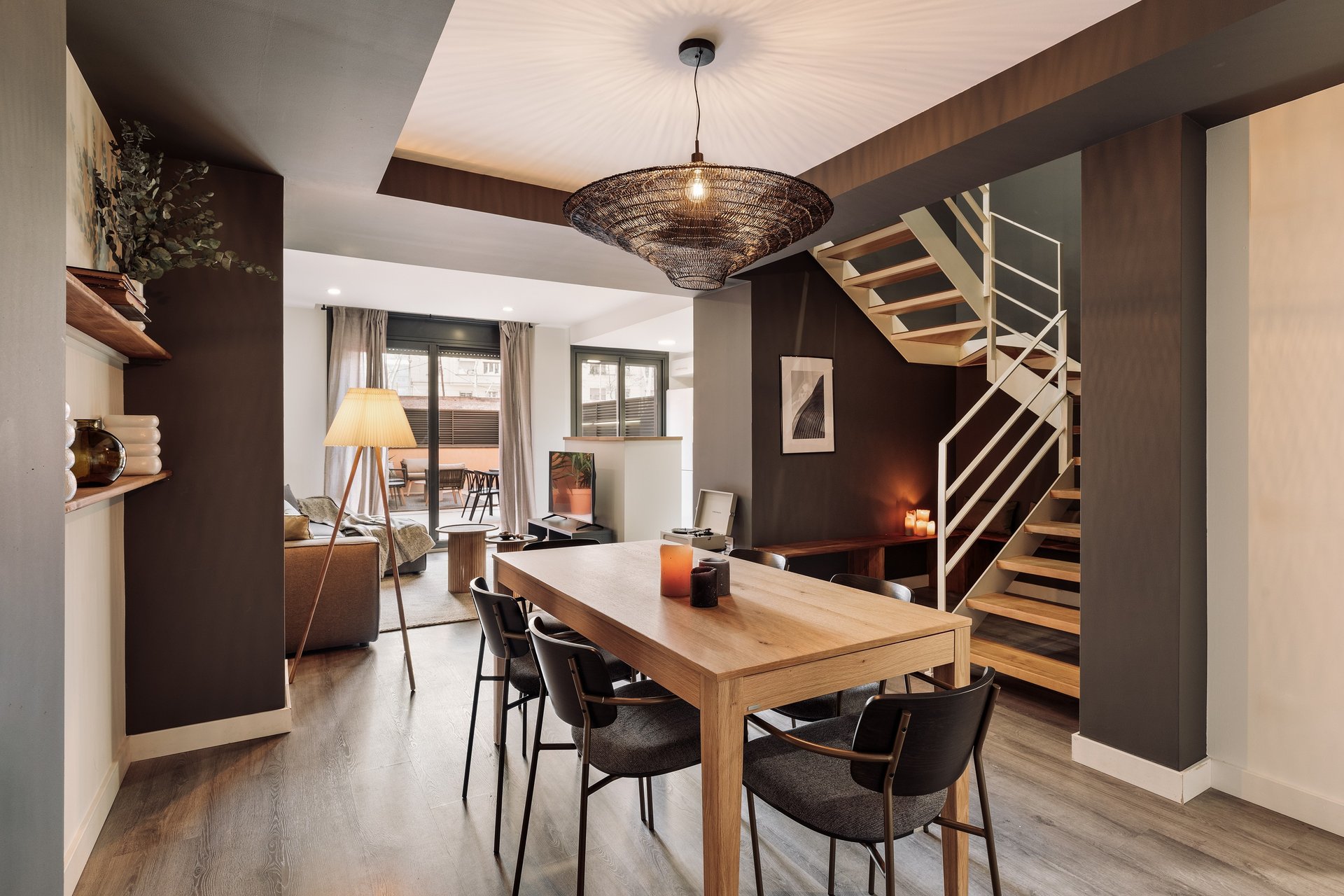 Stylish dining area with contemporary furniture, neutral tones, and a cozy interior design by SAVIA 