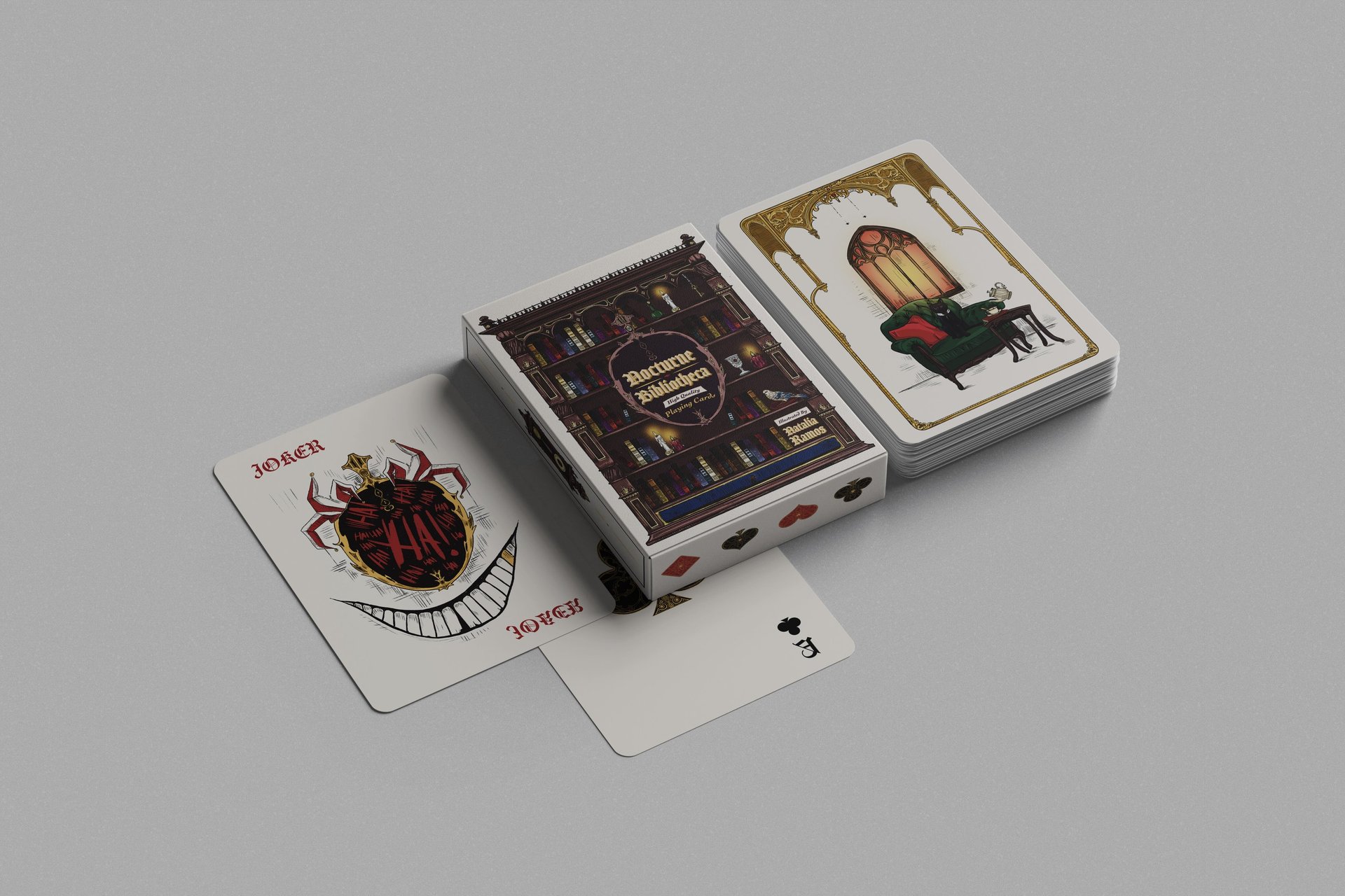 Nocturne Bibliotheca custom playing cards featuring gothic library box art and artistic joker card designs.