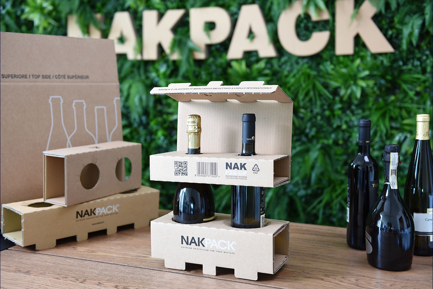 a paper box with two bottle of wine
