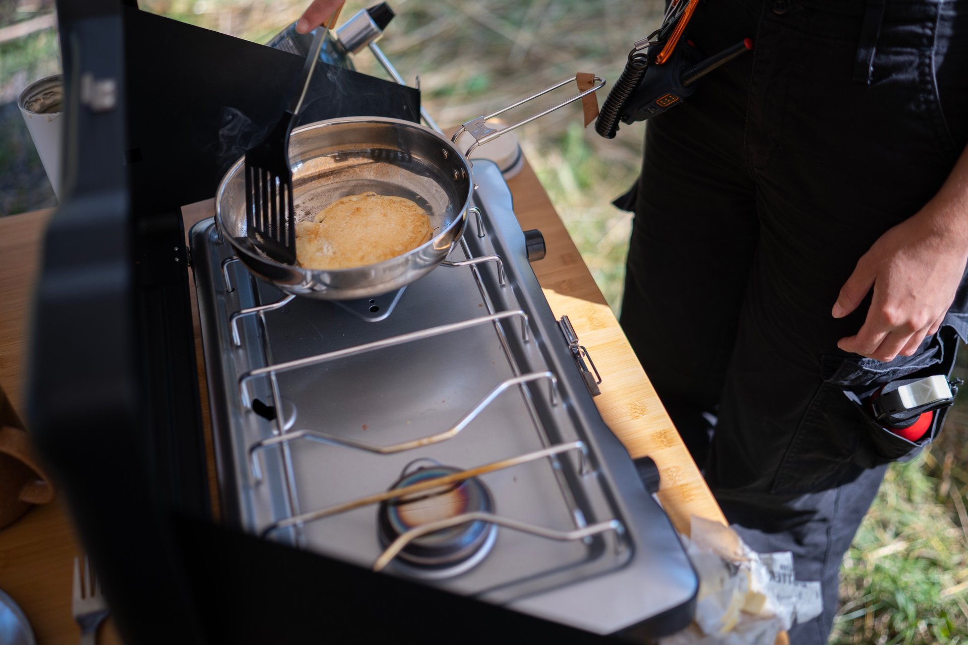 Cooking pancakes on a camp stove