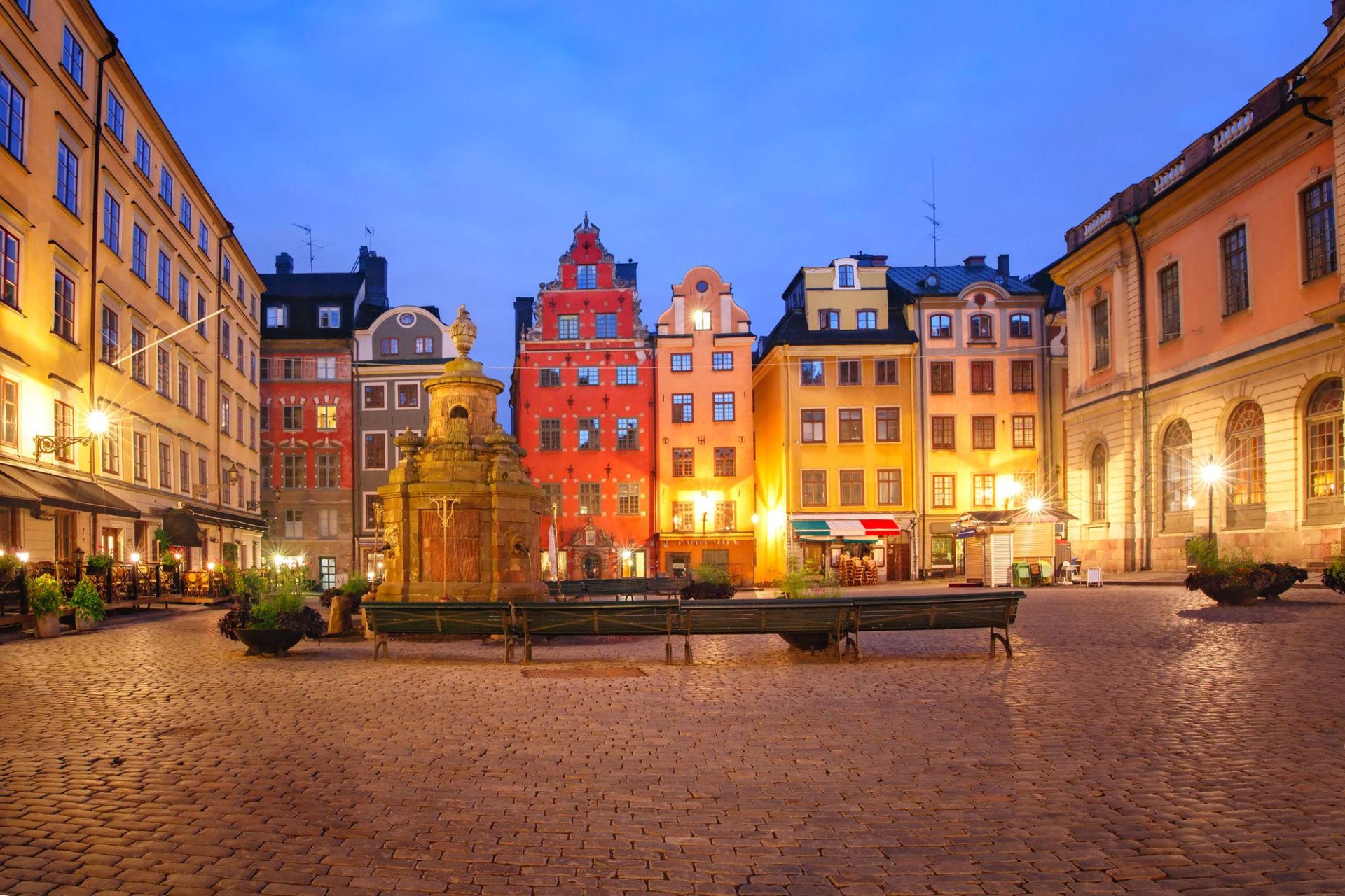 Historic Stortorget public square in Stockholm Gamla Stan with colorful medieval buildings and cobblestone.