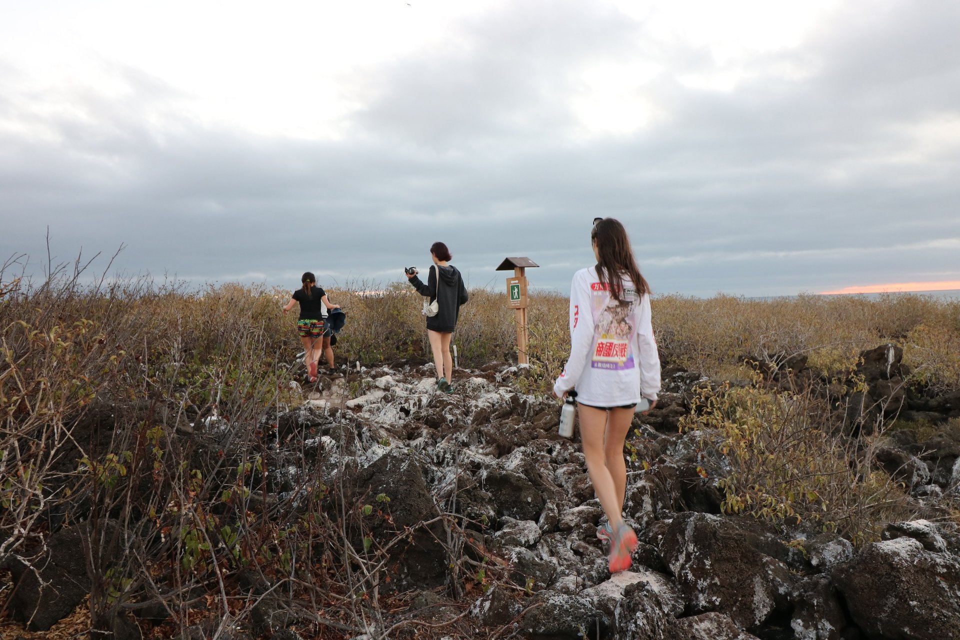 Family exploring Galápagos during a luxury cruise excursion