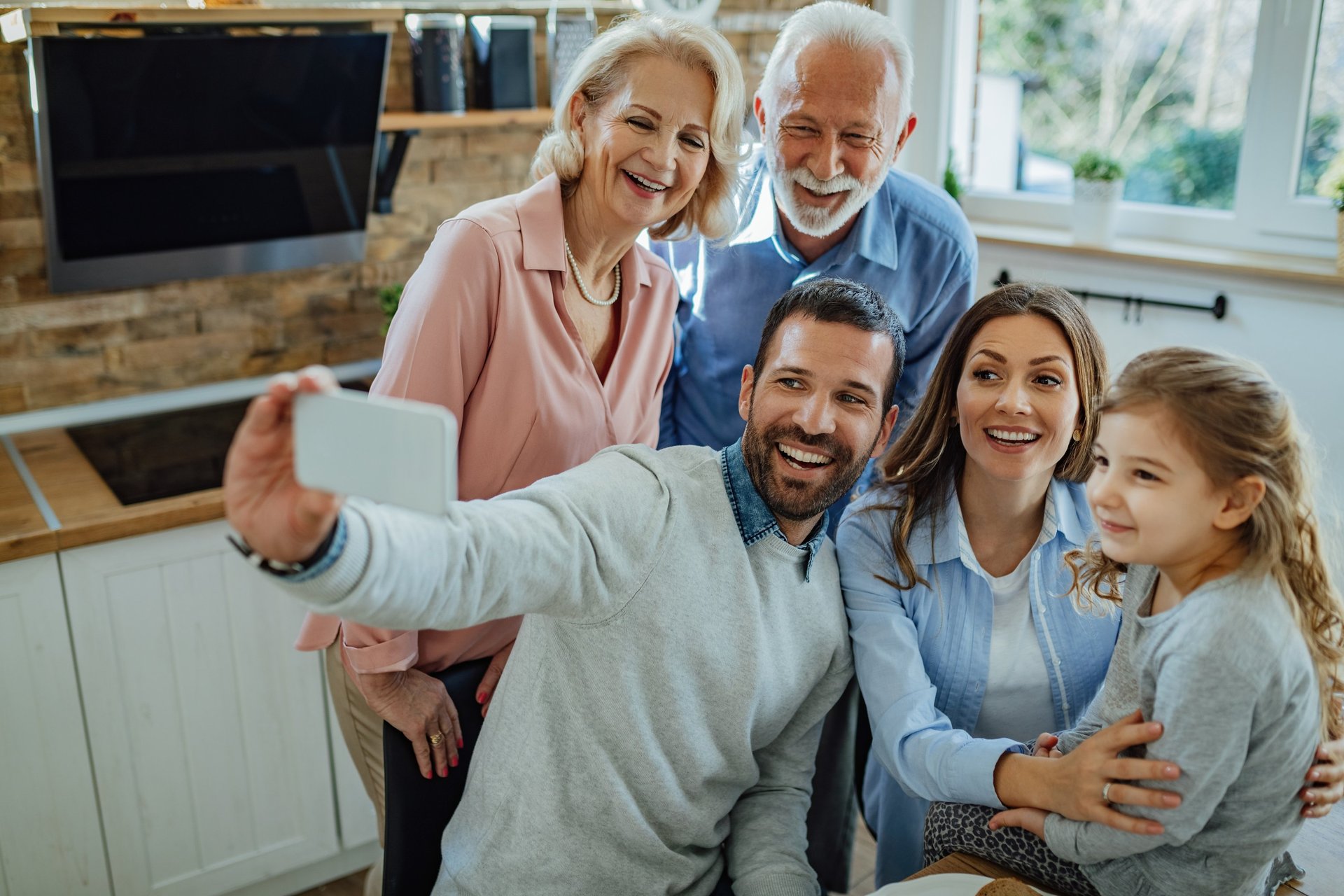 Smiling family receiving home health care support at home