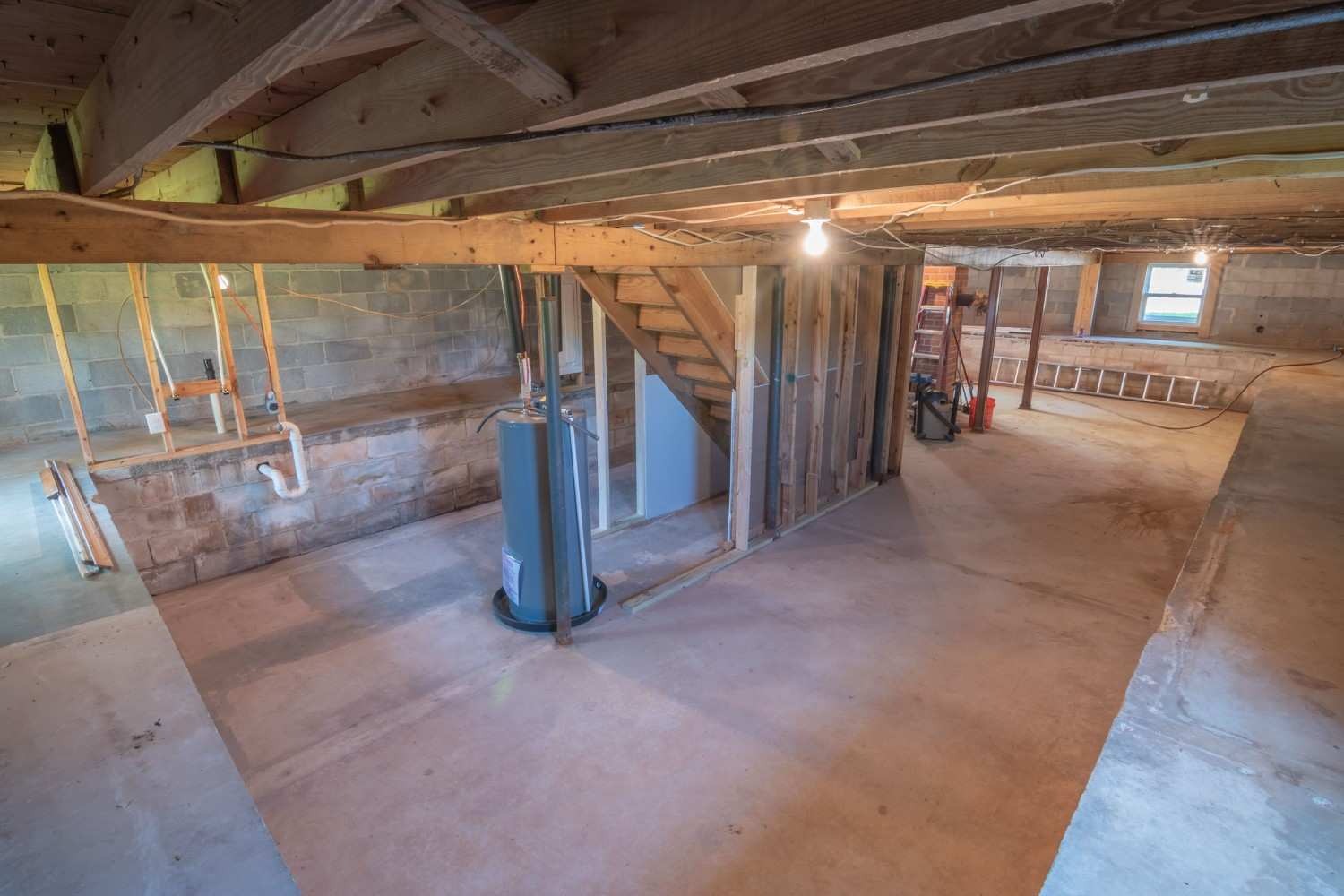 Colorado Springs home crawl space showing difference between professional mold removal on floor joists and clean encapsulated
