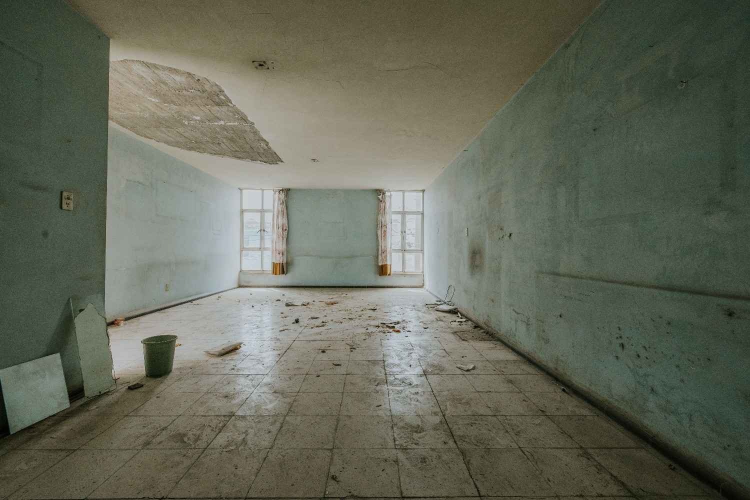 water damaged flooring and wall materials in Colorado Springs home after burst pipe requiring emergency mold prevention