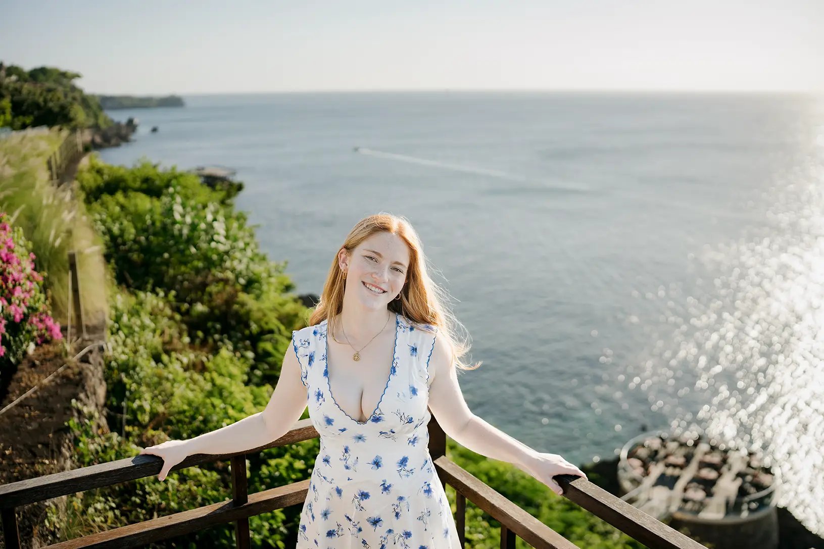 Daughter portrait with panoramic ocean views during a family photography session at AYANA Resort Bali