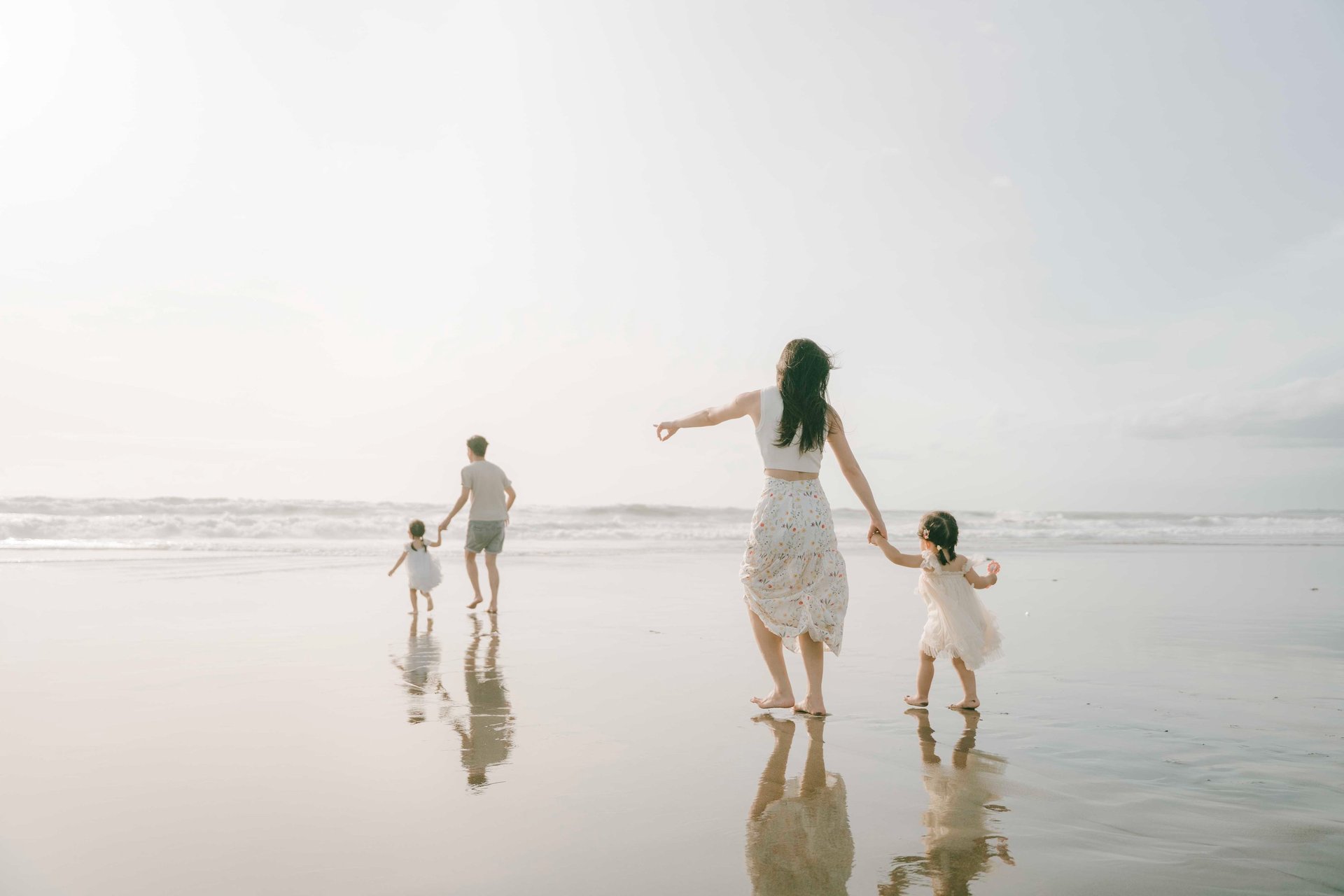 family sunset session at Petitenget Beach Bali