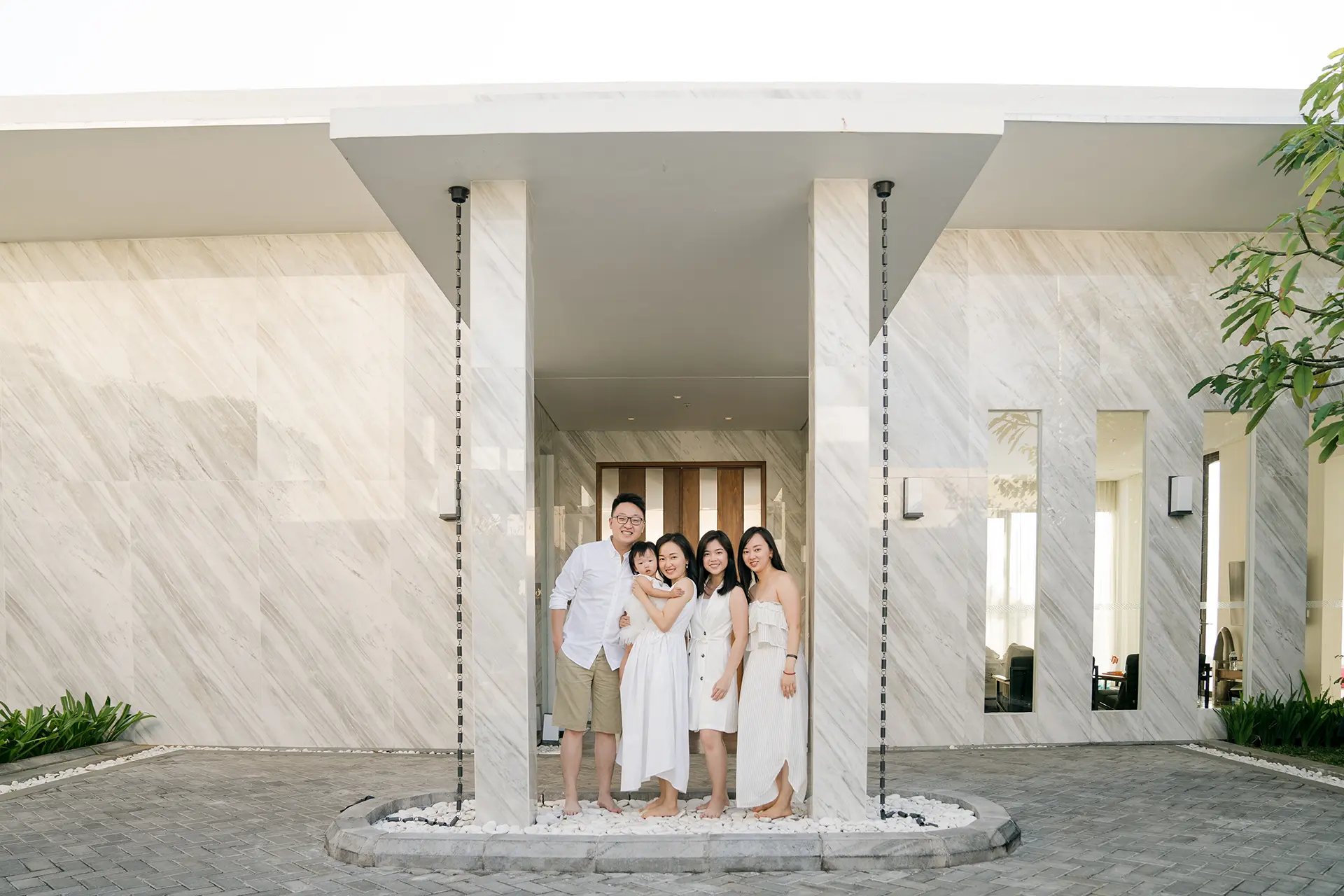 Stefy family portrait at the entrance of Renaissance Uluwatu Bali