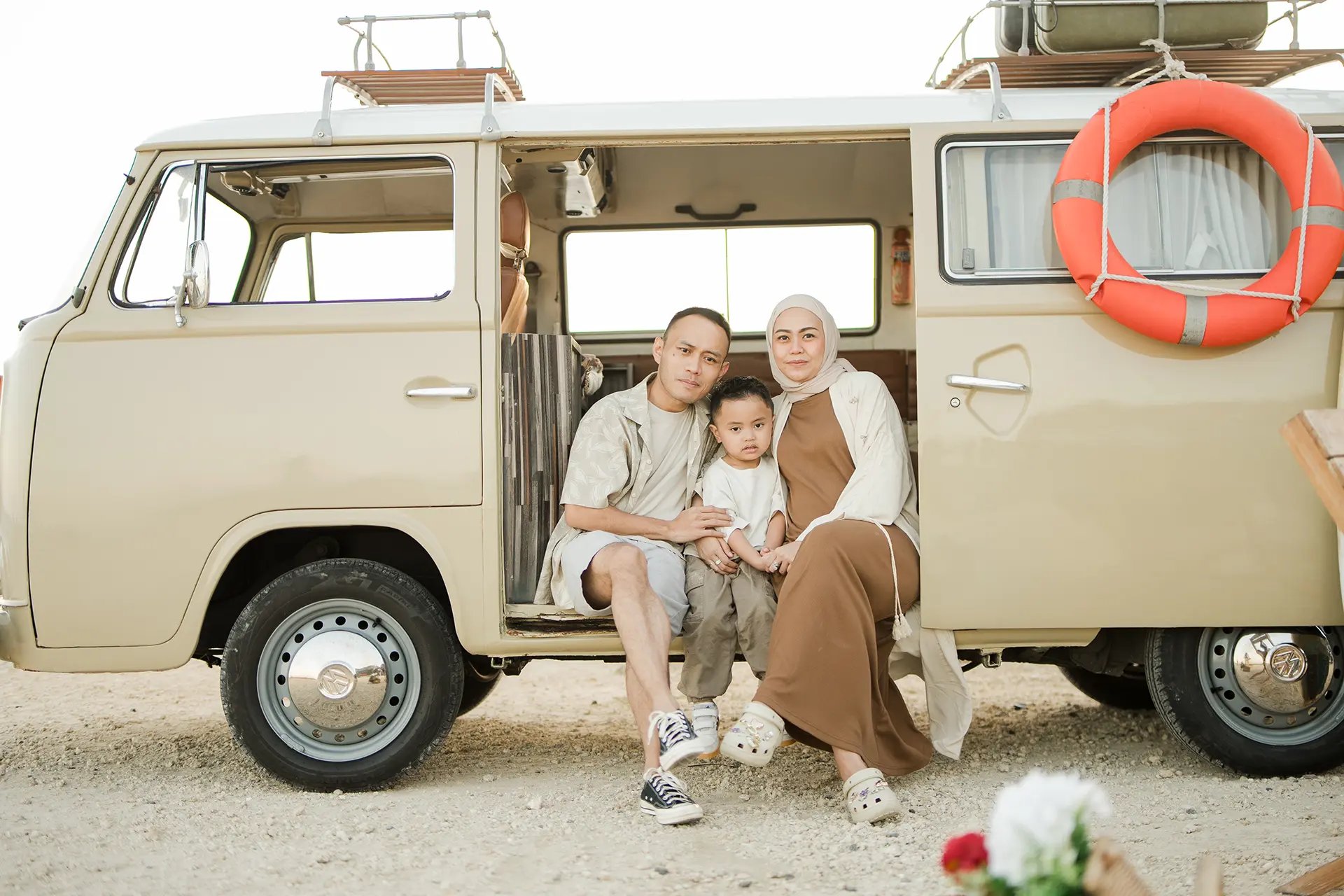 Vintage combi van family photography session of Ilham family at Melasti Beach Bali